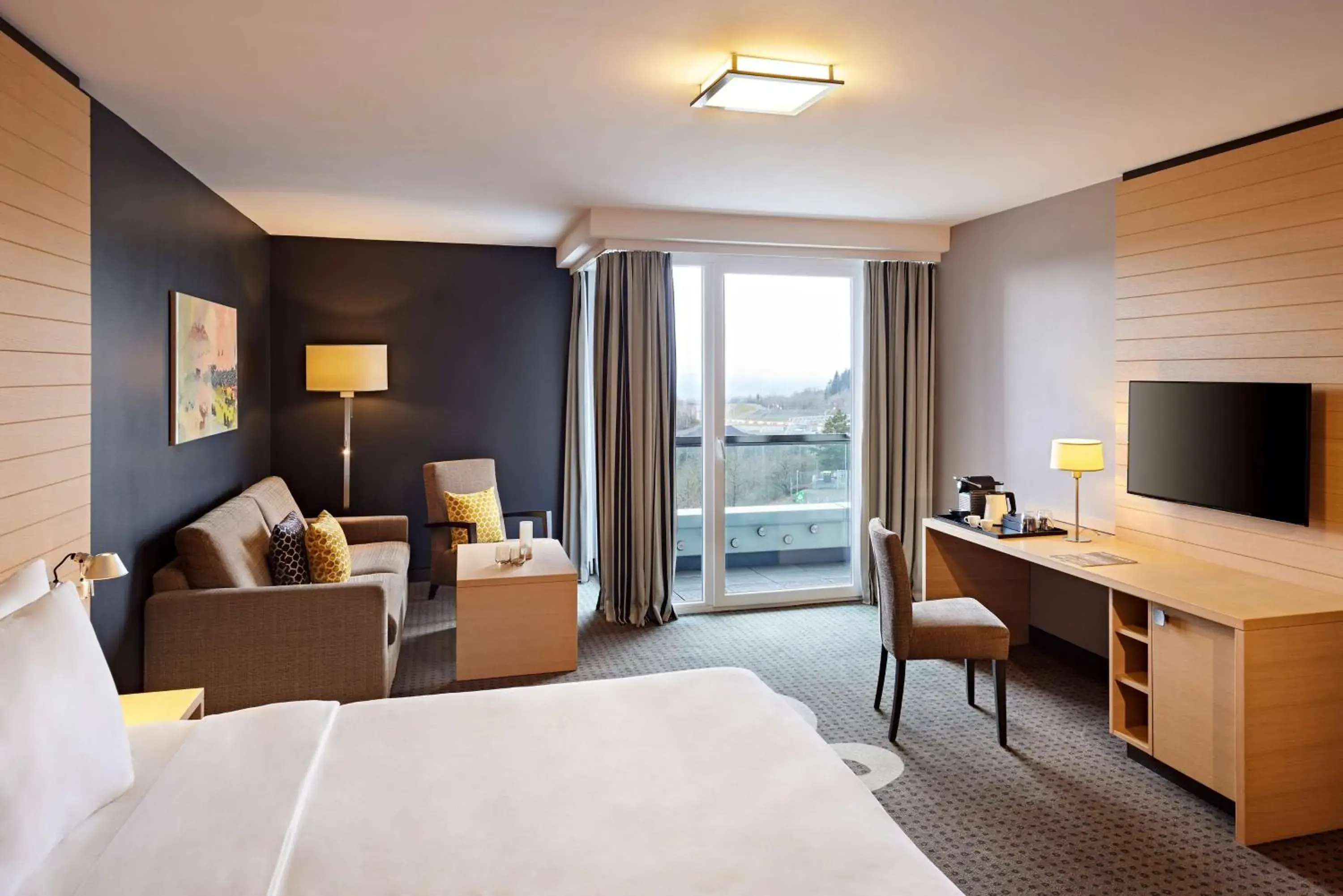 Photo of the whole room, Bed in Nürburgring Congress Hotel Photo of the whole room, Bed in Nürburgring Congress Hotel