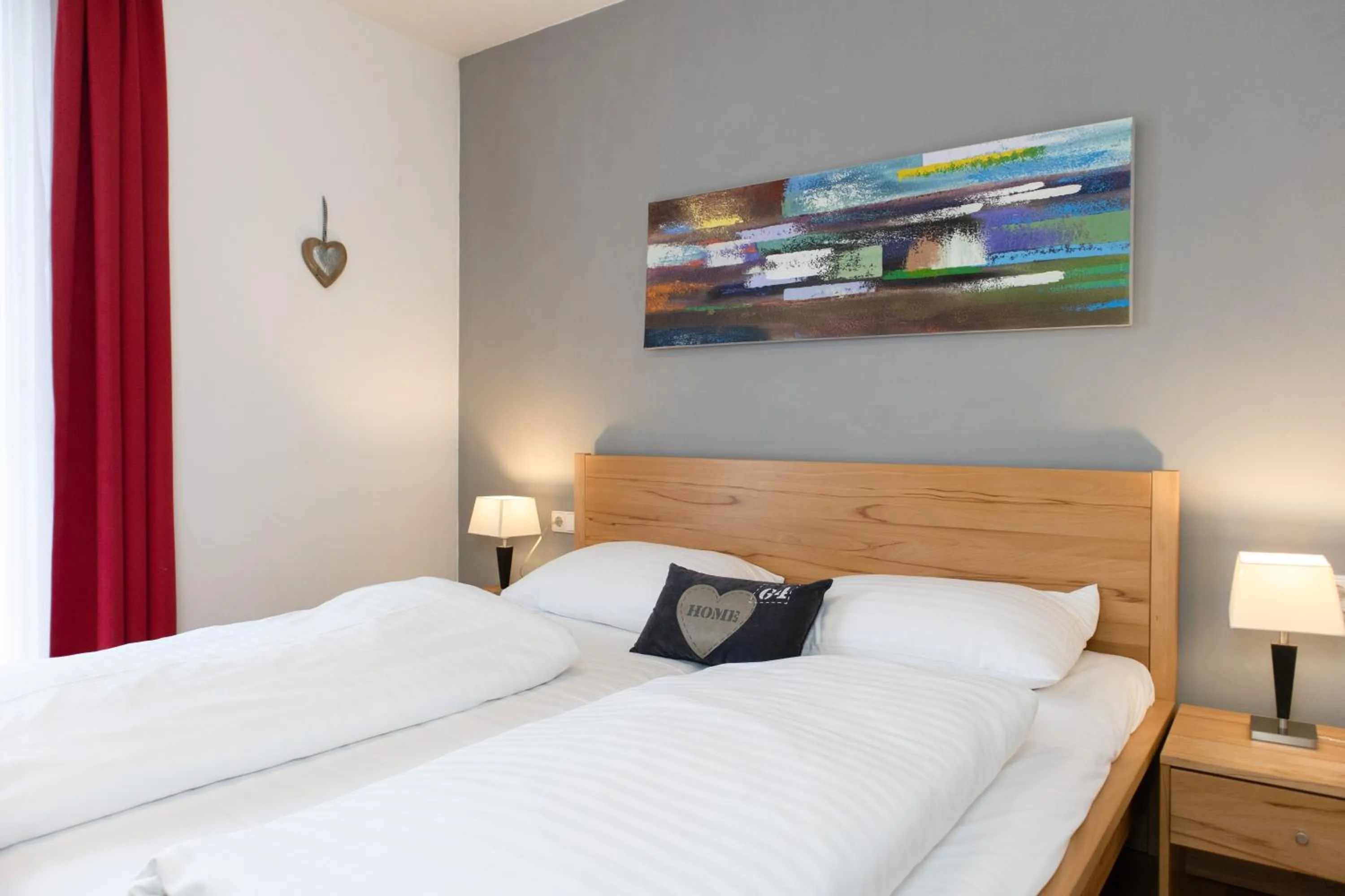 Bed in Apartment Adler Resort by Alpin Rentals