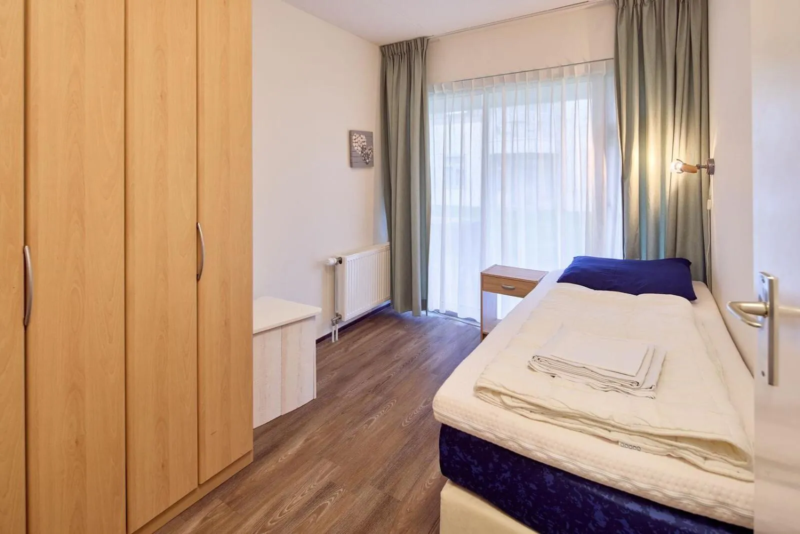 Bed in De Pelikaan Texel Appartementen