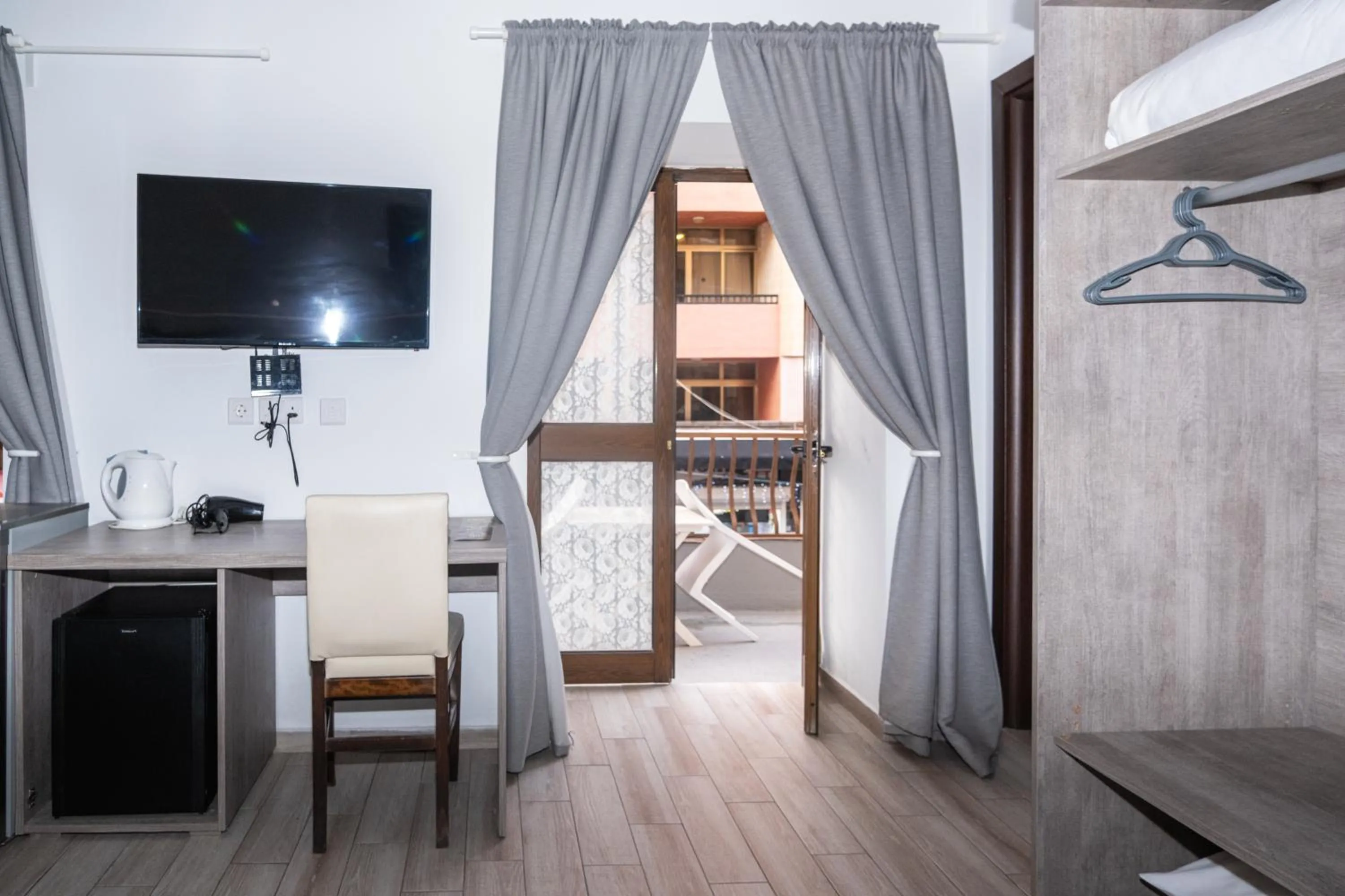 Bed in Napoli Suites Studios Aparthotel