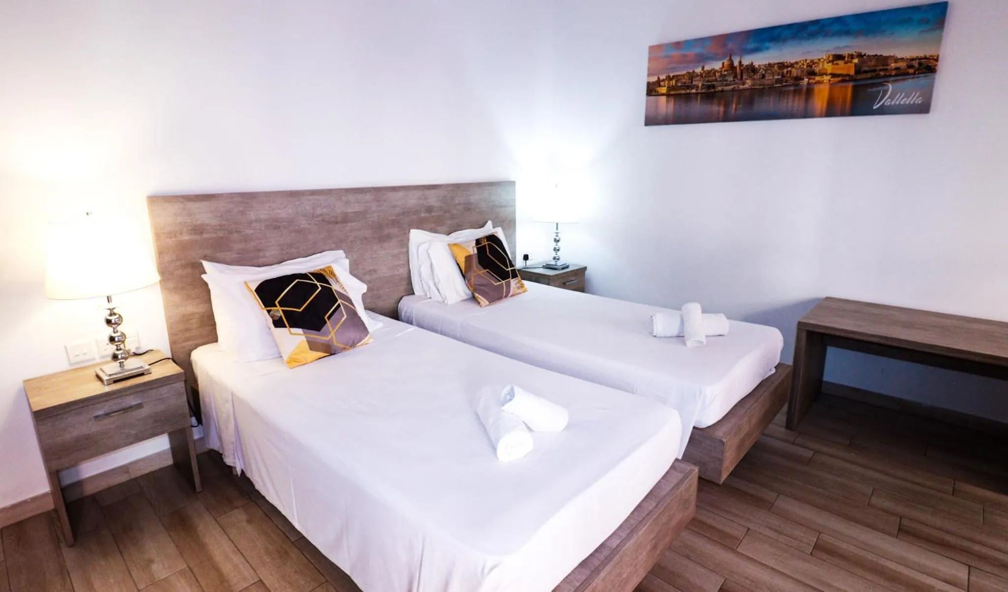 Bed in Napoli Suites Studios Aparthotel