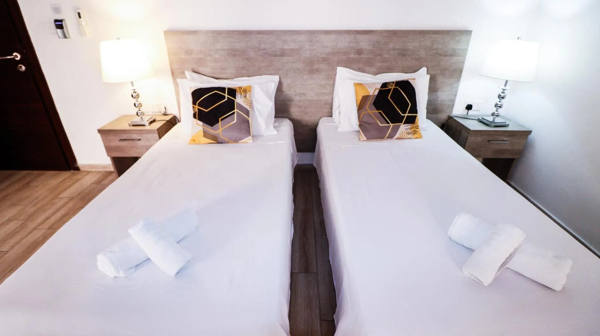 Bed in Napoli Suites Studios Aparthotel