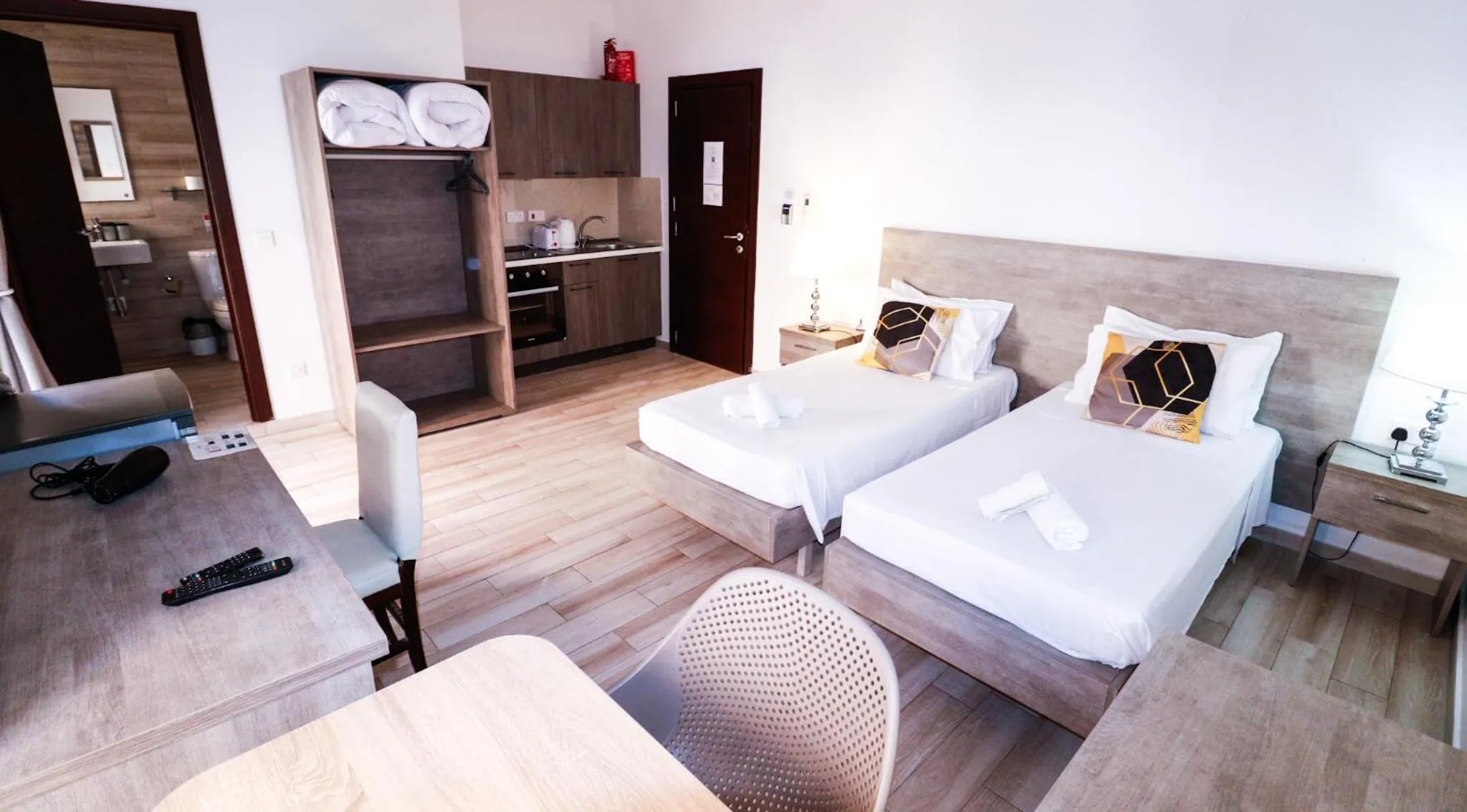 Photo of the whole room, Bed in Napoli Suites Studios Aparthotel