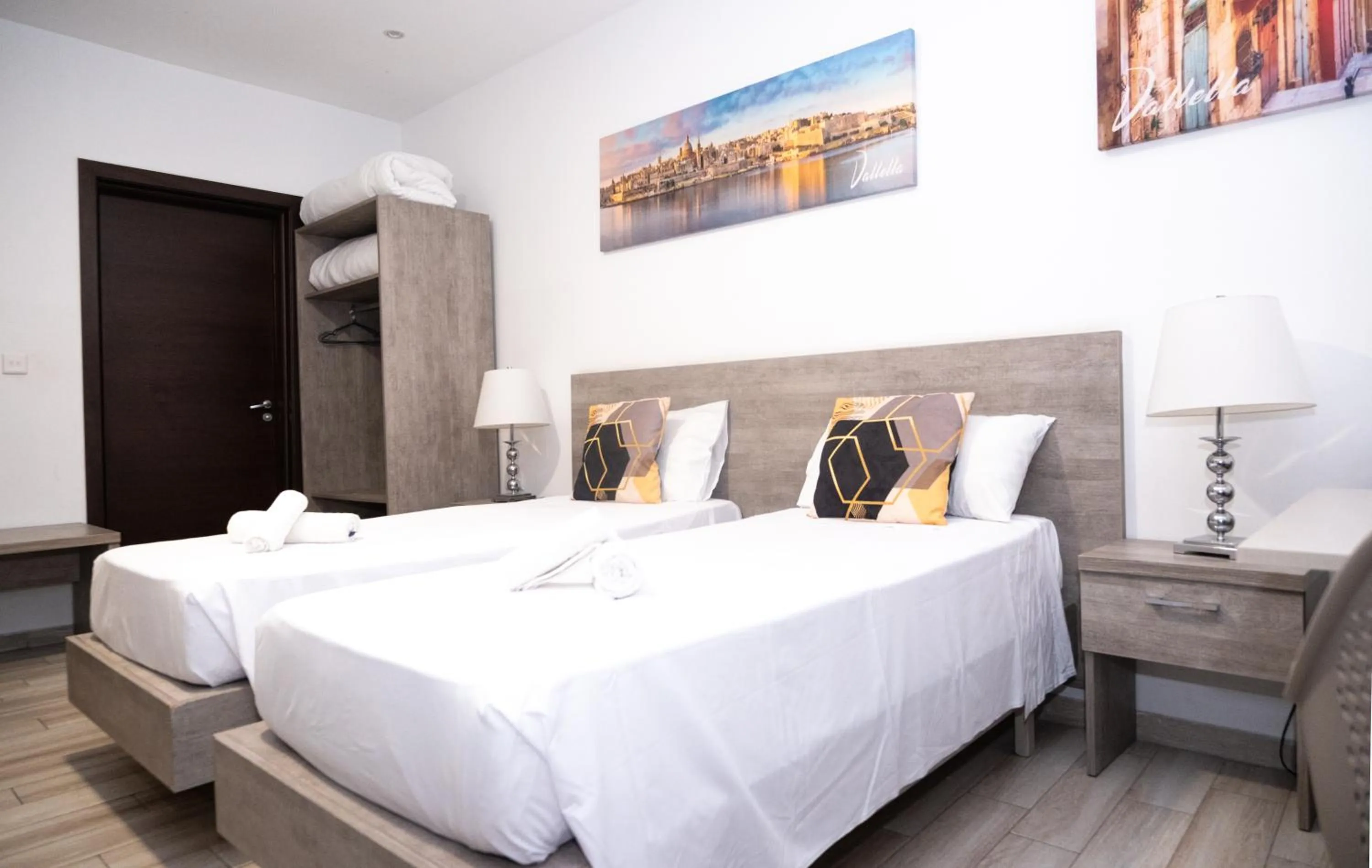 Bed in Napoli Suites Studios Aparthotel