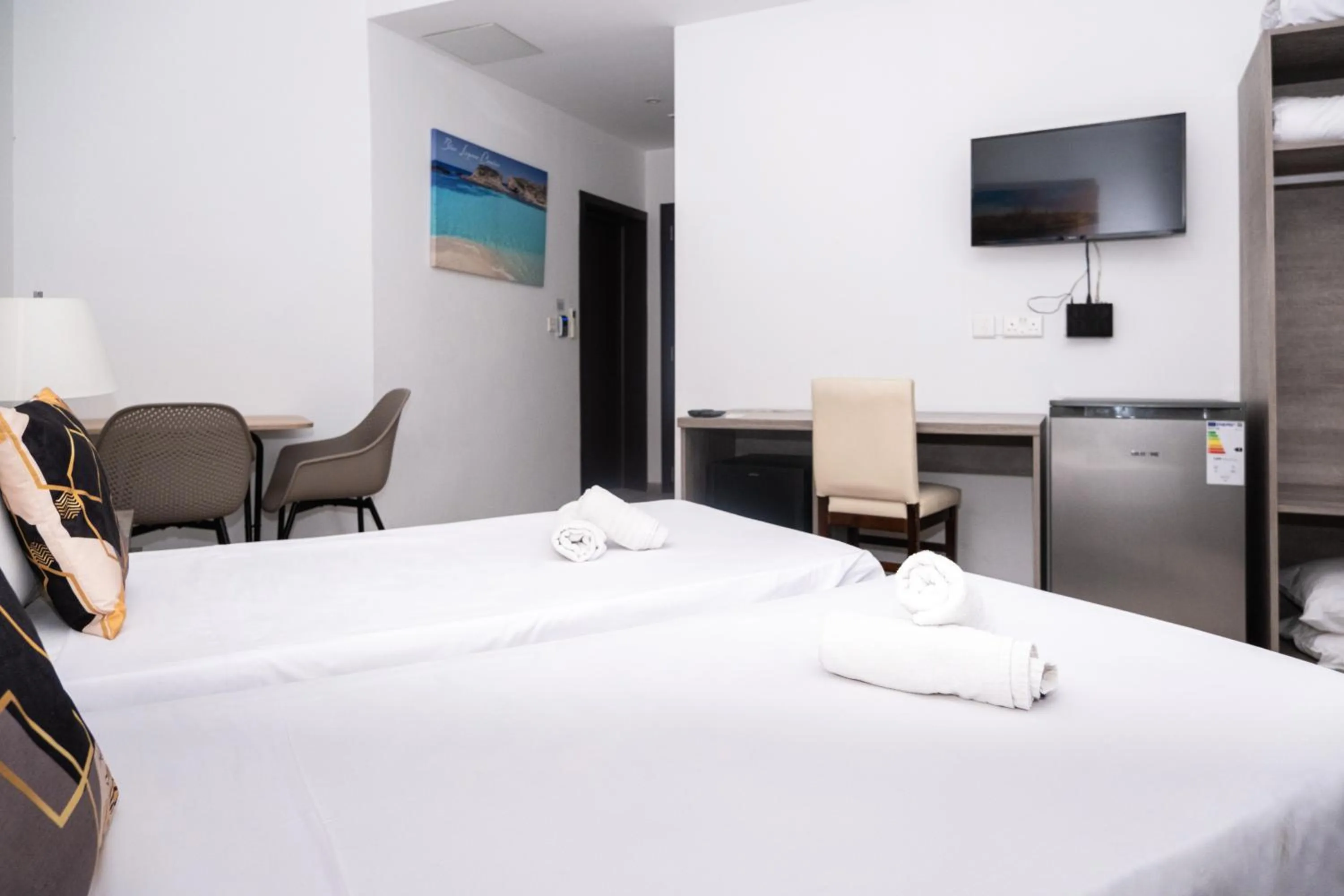 Bed in Napoli Suites Studios Aparthotel