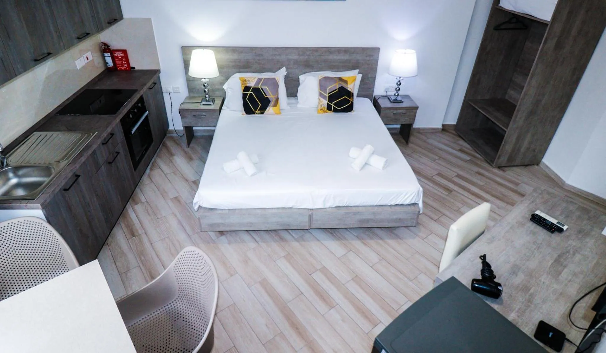 Bed in Napoli Suites Studios Aparthotel