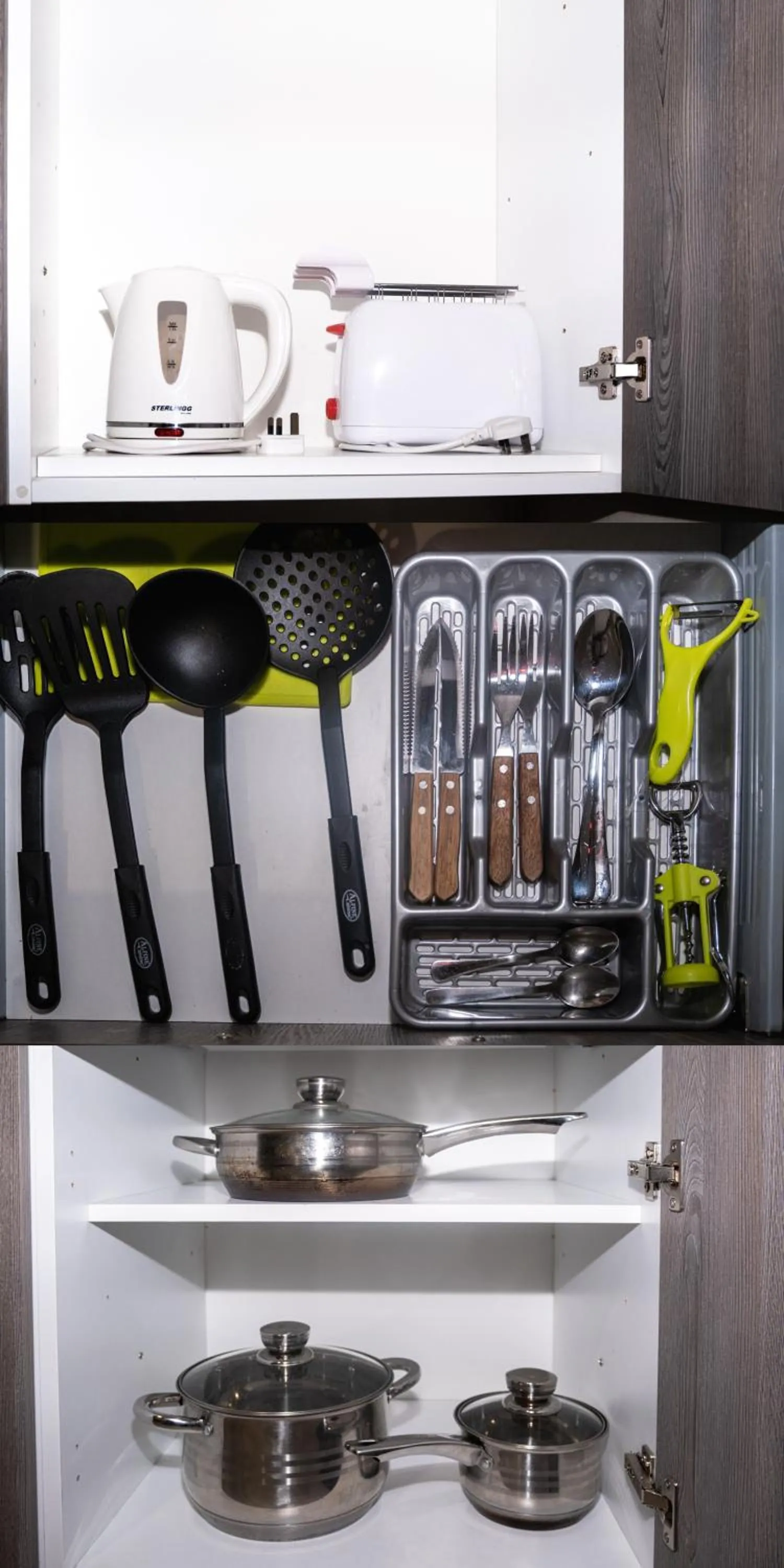 Kitchen or kitchenette in Napoli Suites Studios Aparthotel