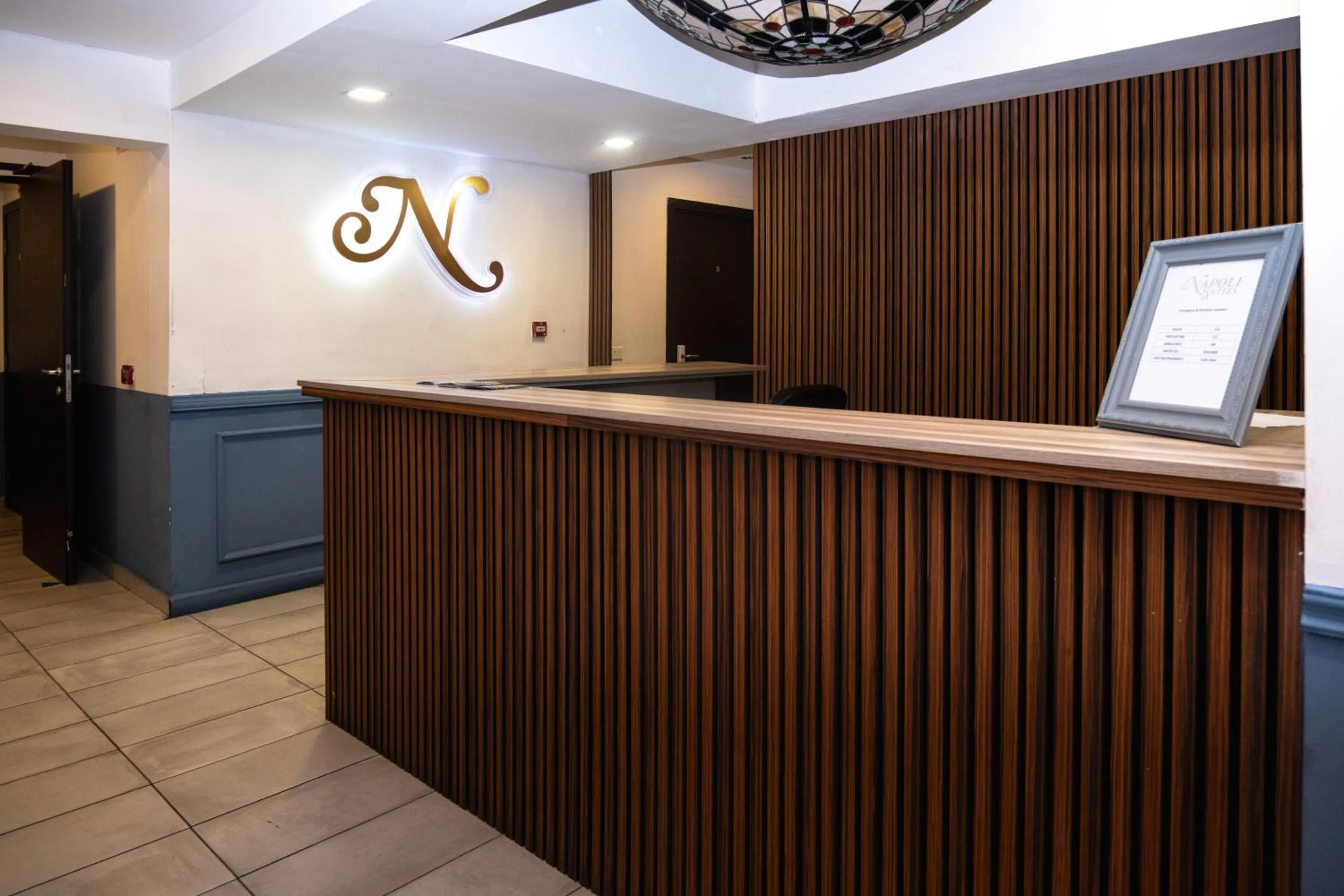 Lobby or reception in Napoli Suites Studios Aparthotel