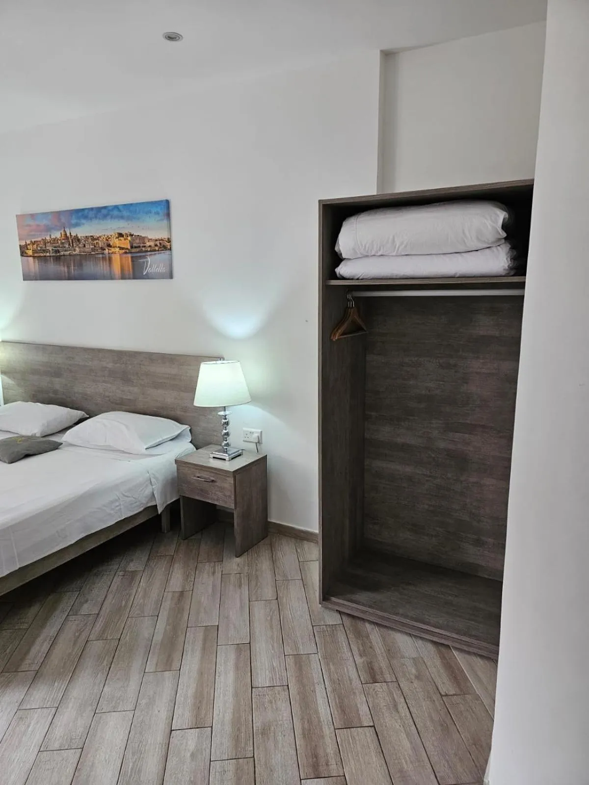Bed in Napoli Suites Studios Aparthotel