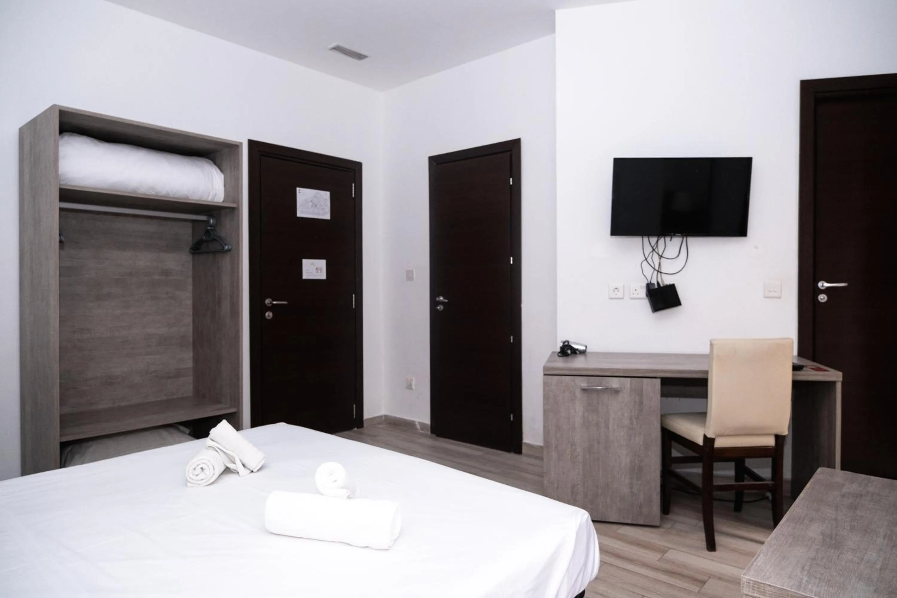 Bed in Napoli Suites Studios Aparthotel