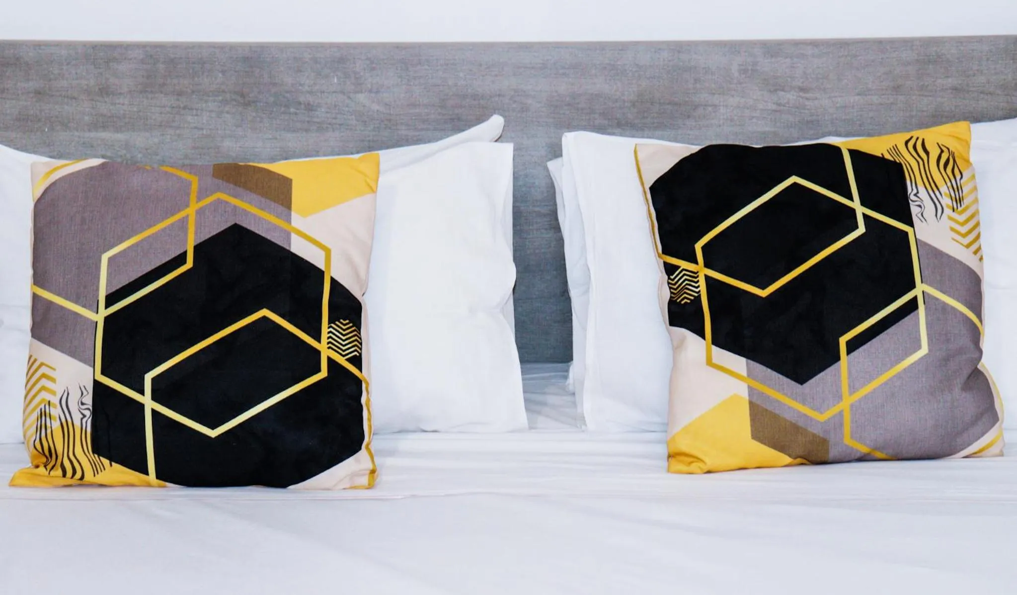 Bed in Napoli Suites Studios Aparthotel