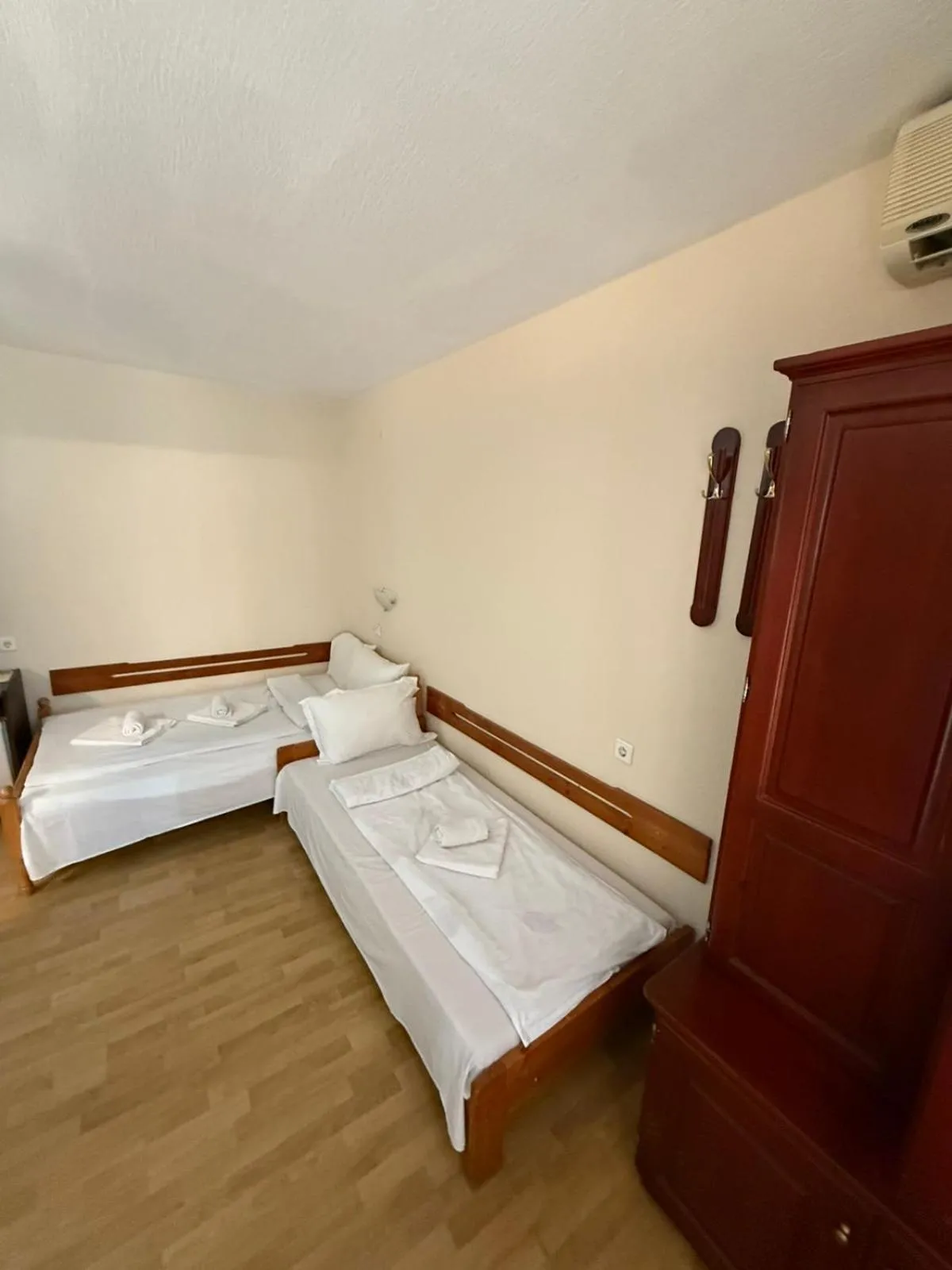 Bed in Family Hotel Studio