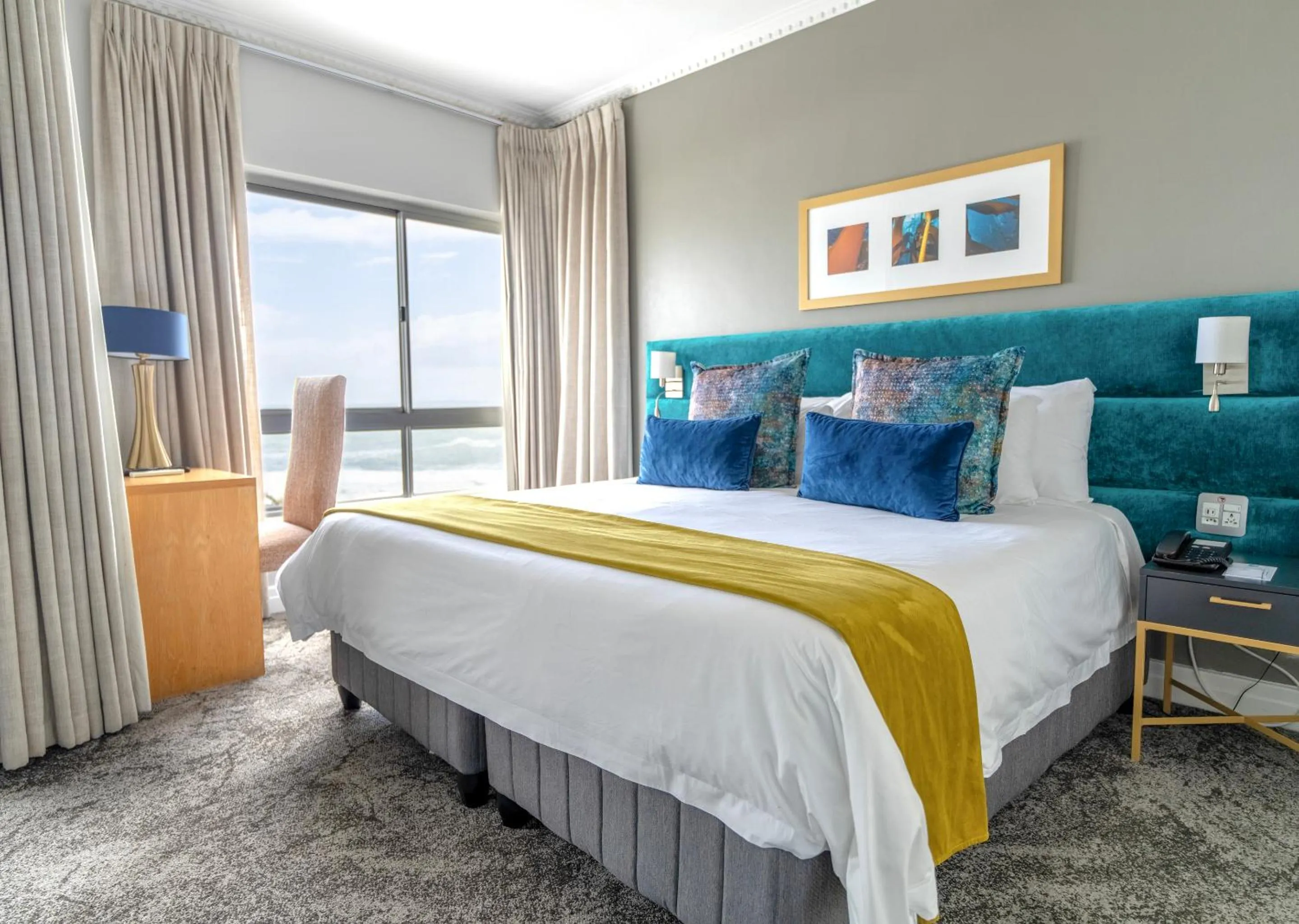 Bed in Peninsula All Suite Hotel by Dream Resorts