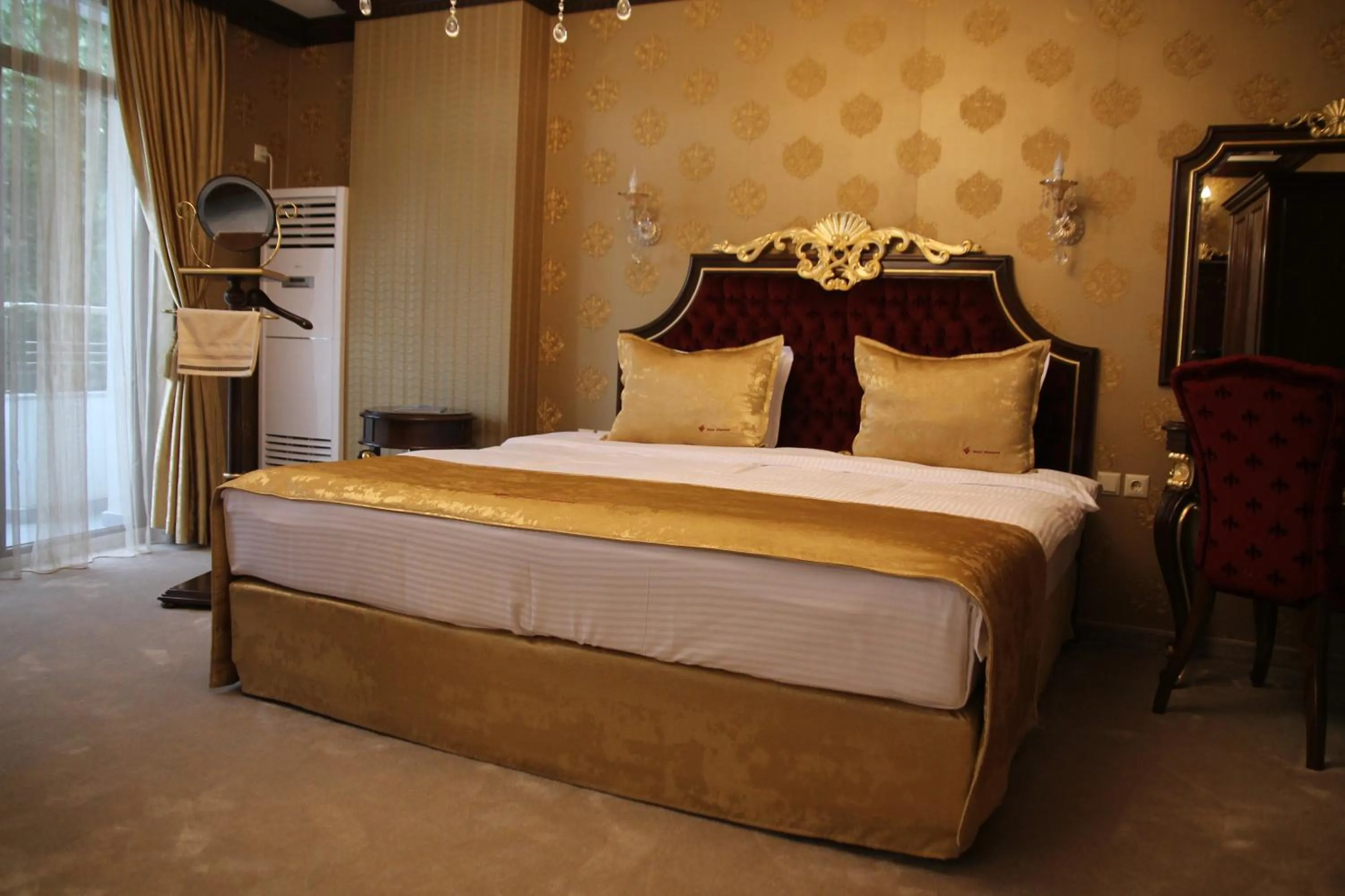 Bed in Hotel Diamond