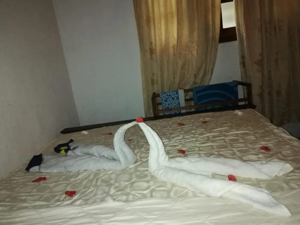 Property building, Bed in Triple One Villa