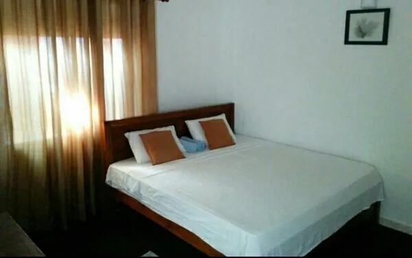 Bed in Triple One Villa