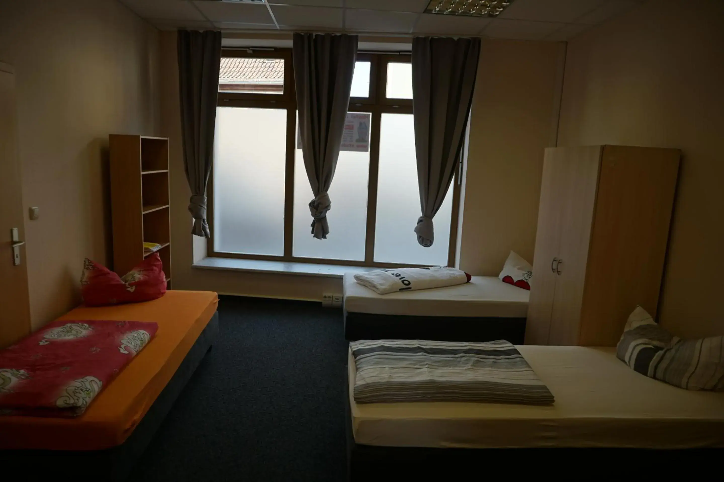 Basic Triple Room with Shared Bathroom - single occupancy in Hostel Vorharz Aschersleben Basic Triple Room with Shared Bathroom - single occupancy in Hostel Vorharz Aschersleben