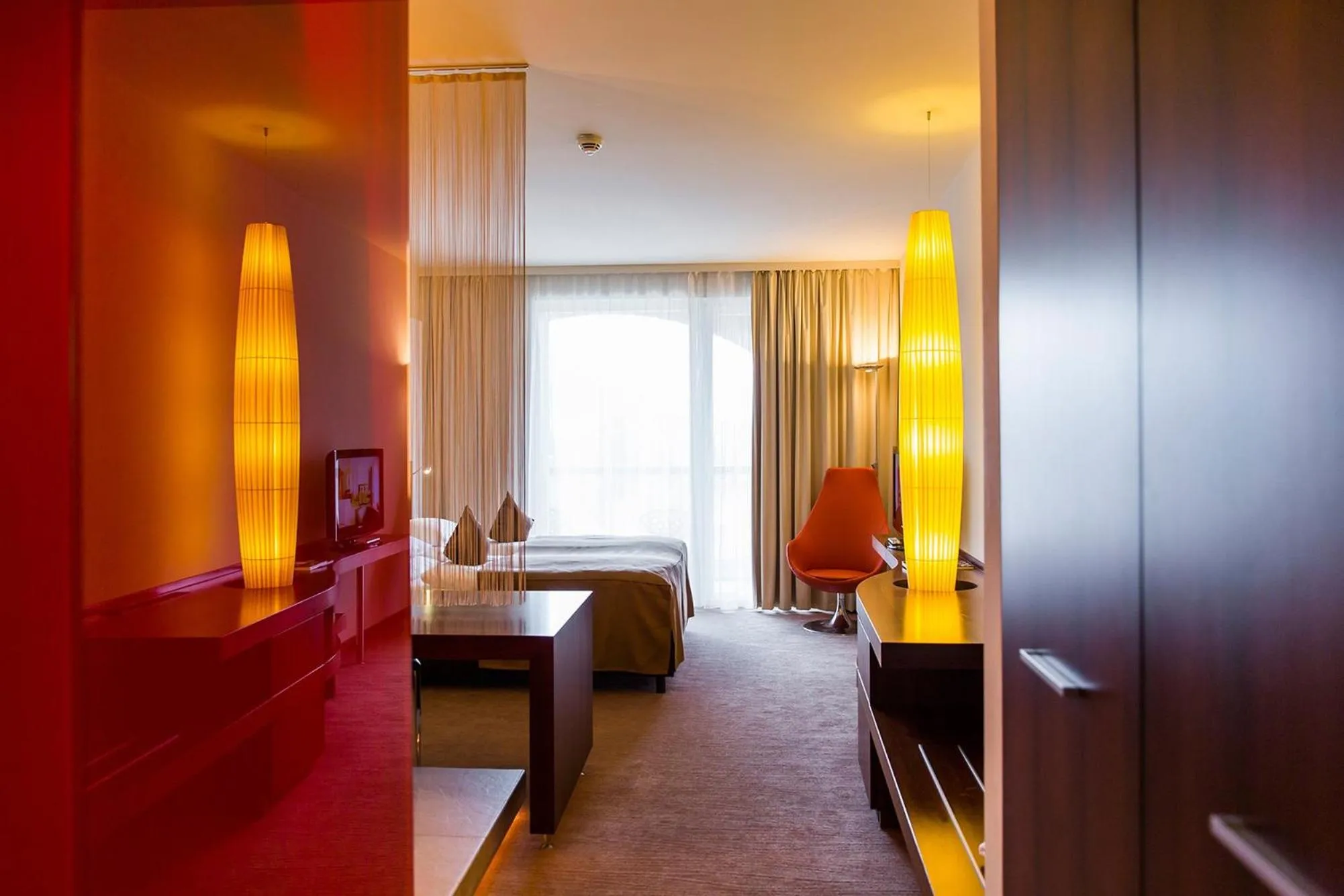 Photo of the whole room, Bed in Das Seepark Wörthersee Resort