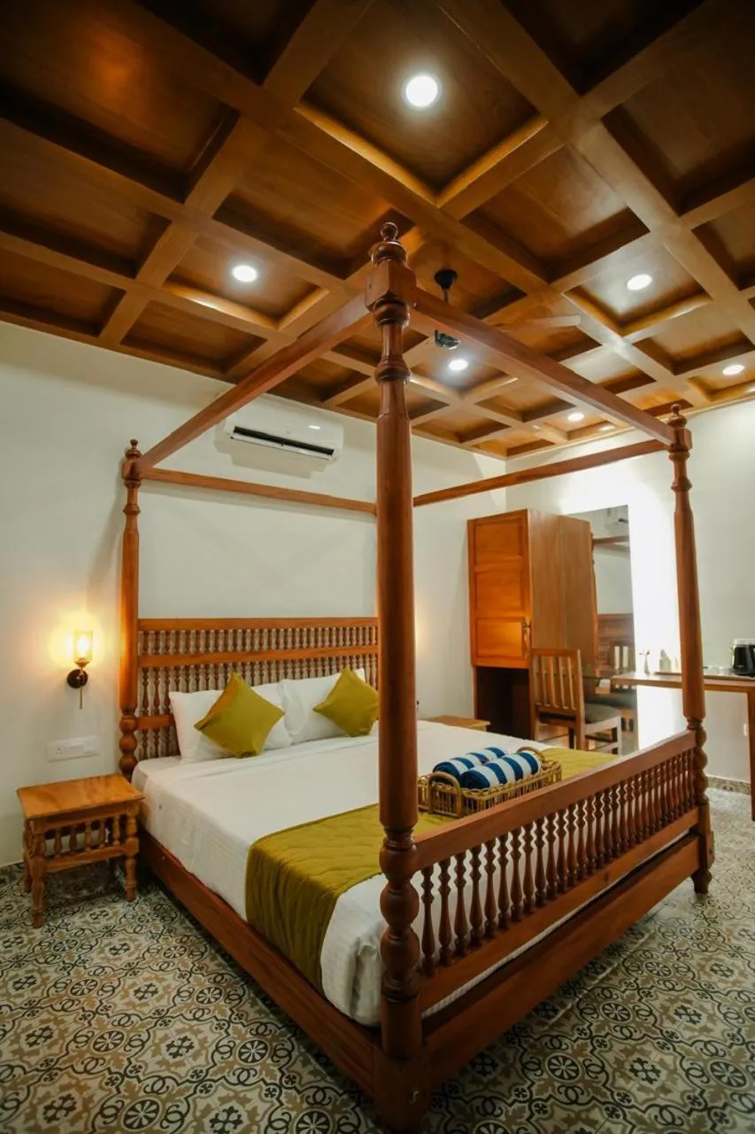 Bed in Haven Alleppey Beach Resort
