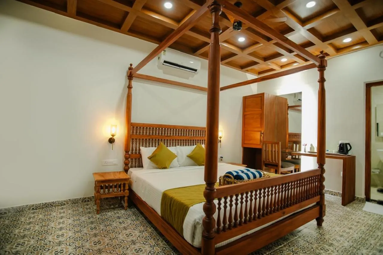 Bed in Haven Alleppey Beach Resort