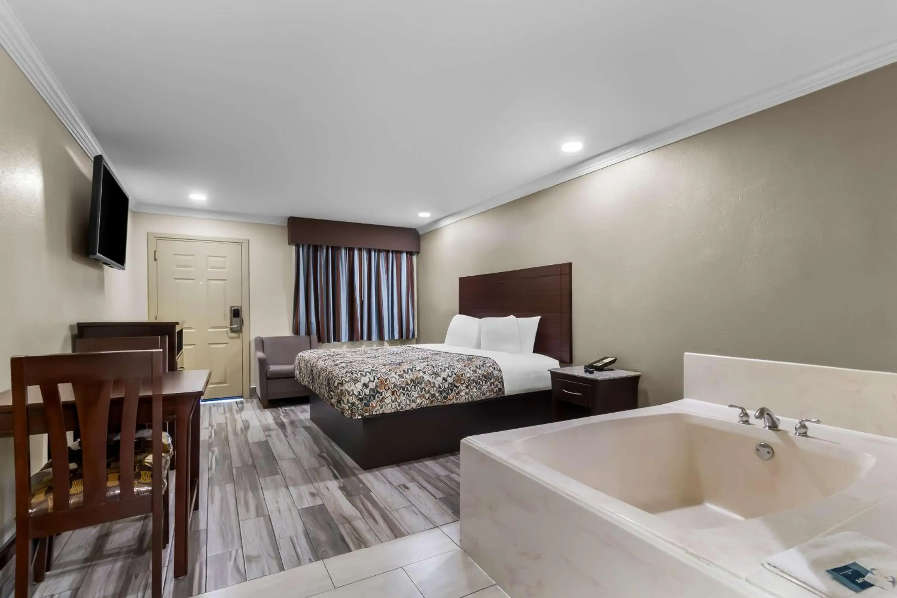 Bedroom, Bed in Americas Best Value Inn Houston Heights at I-45 Bedroom, Bed in Americas Best Value Inn Houston Heights at I-45