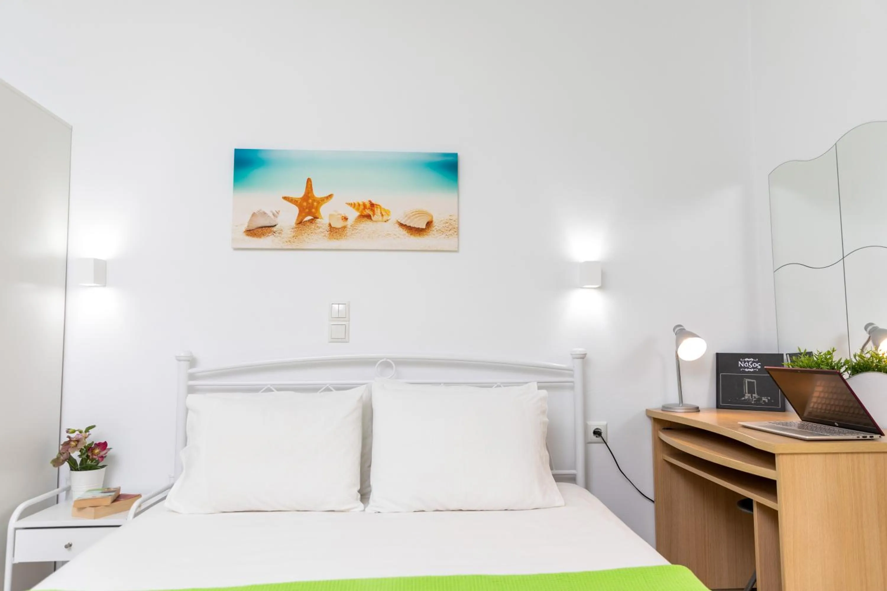 Bed in NAXOS DIAMOND Studios Apartments