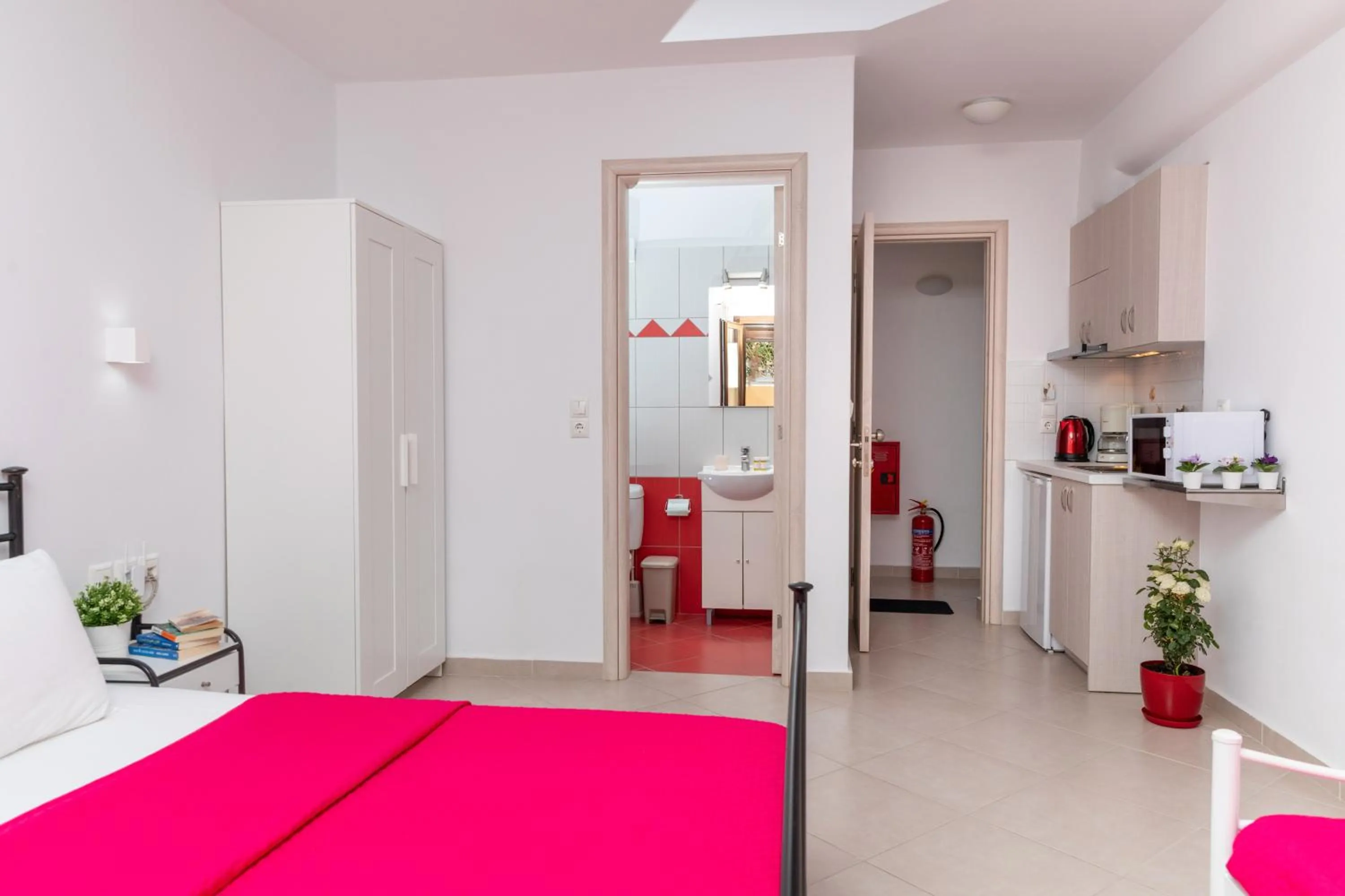 Bed in NAXOS DIAMOND Studios Apartments