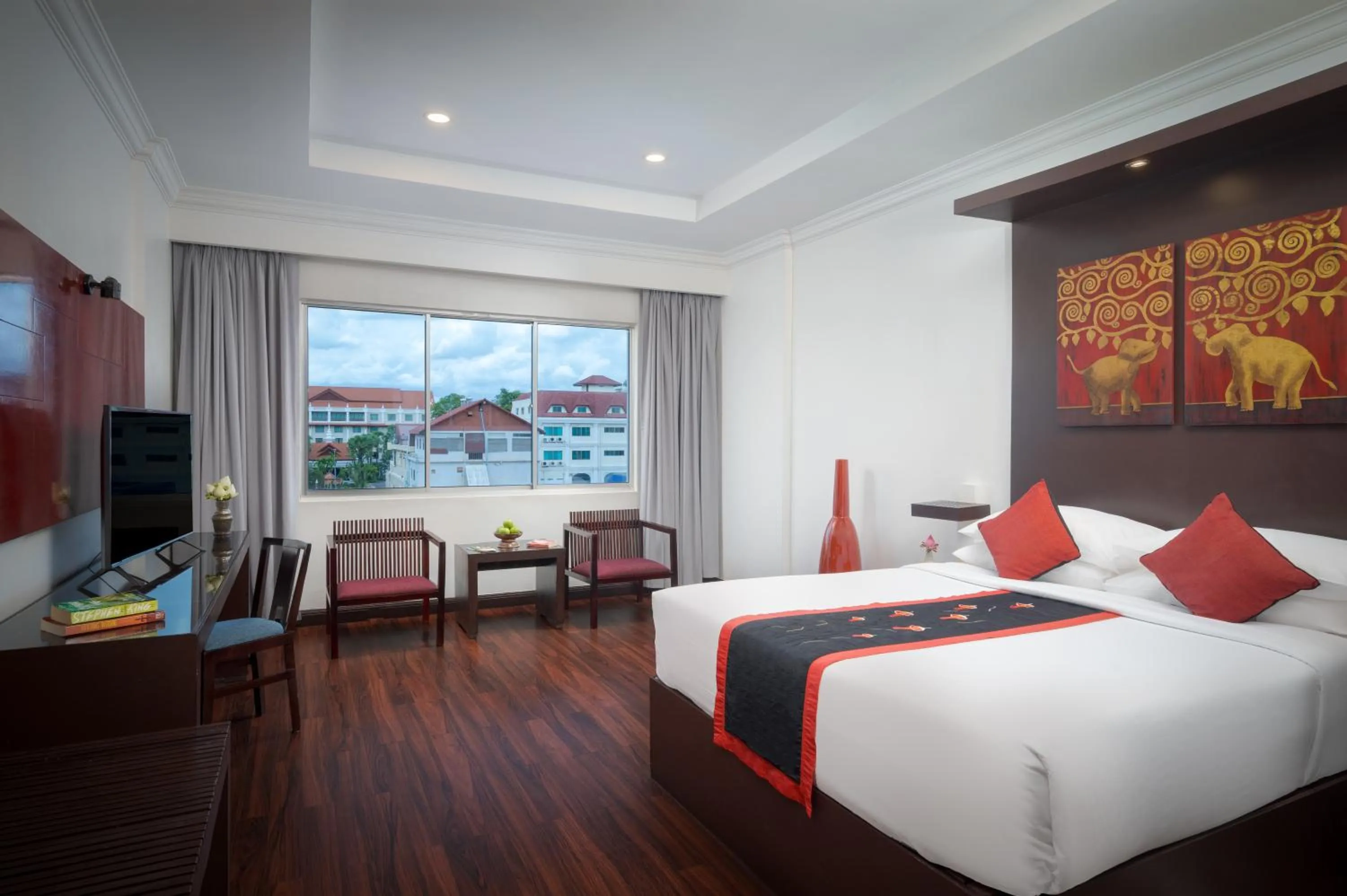 Bed in Memoire d' Angkor Boutique Hotel