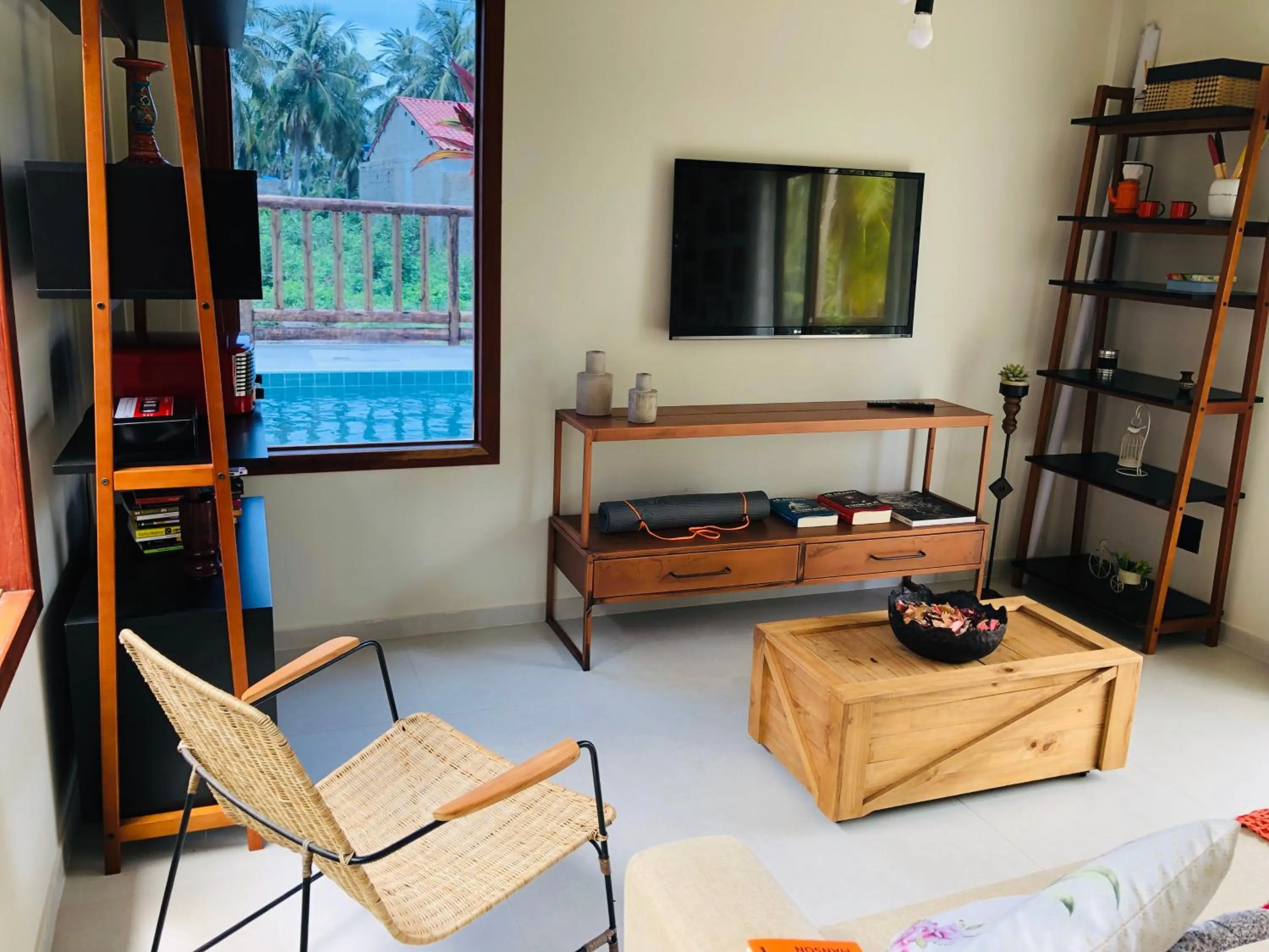 Communal lounge/ TV room in Pousada Divino Milagre