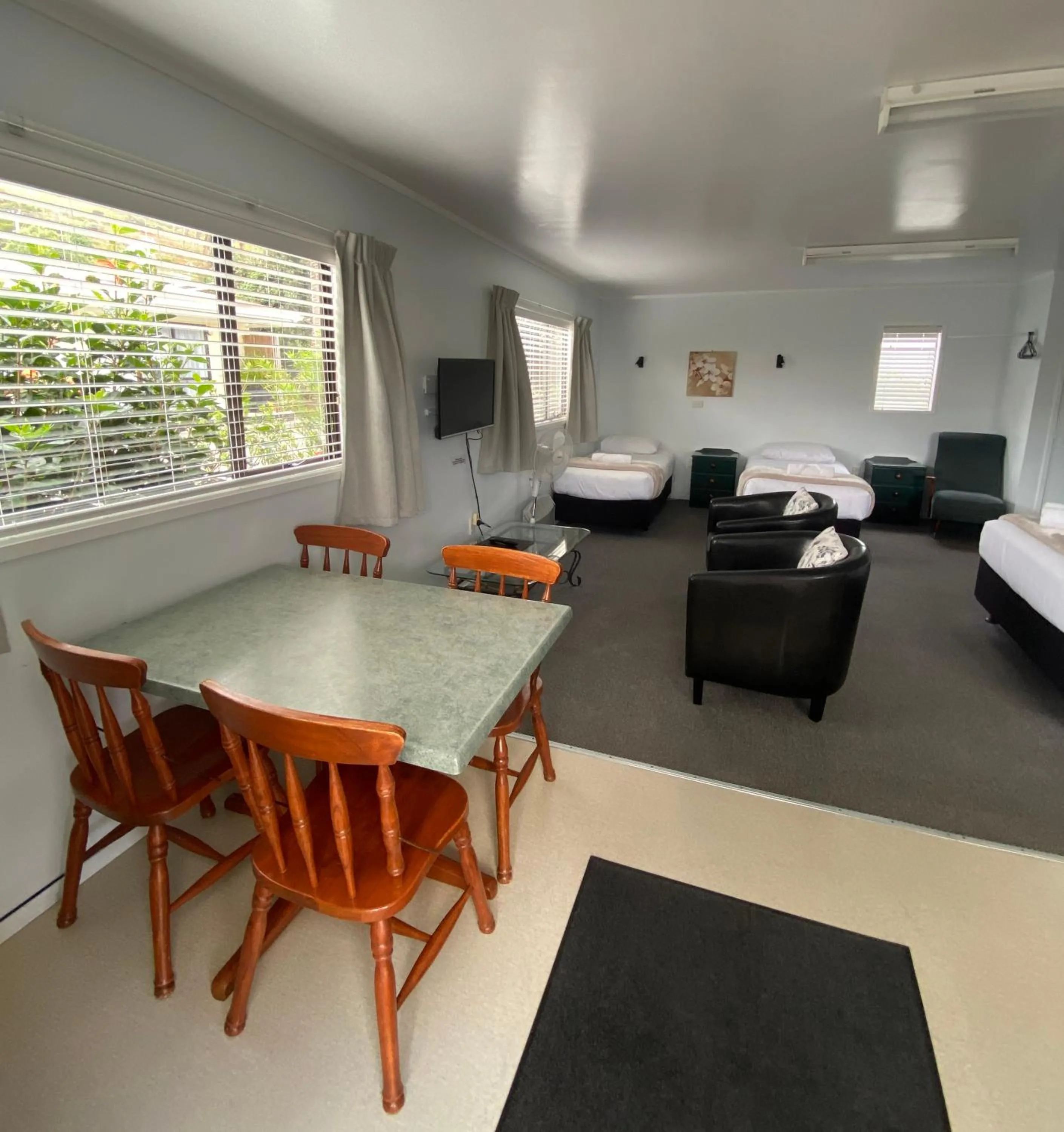 Seating area, Bed in Opononi Lighthouse Motel