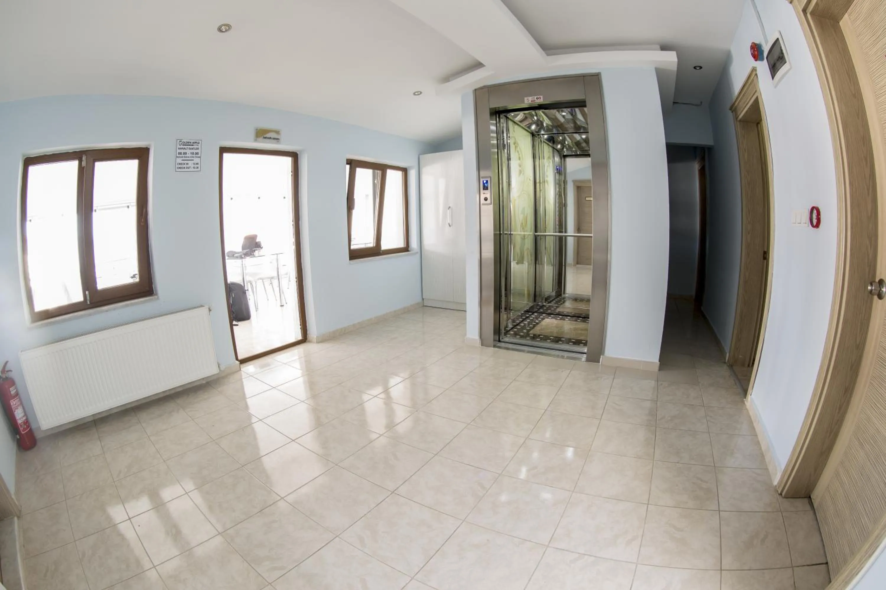 elevator in Golden Apple Hotel
