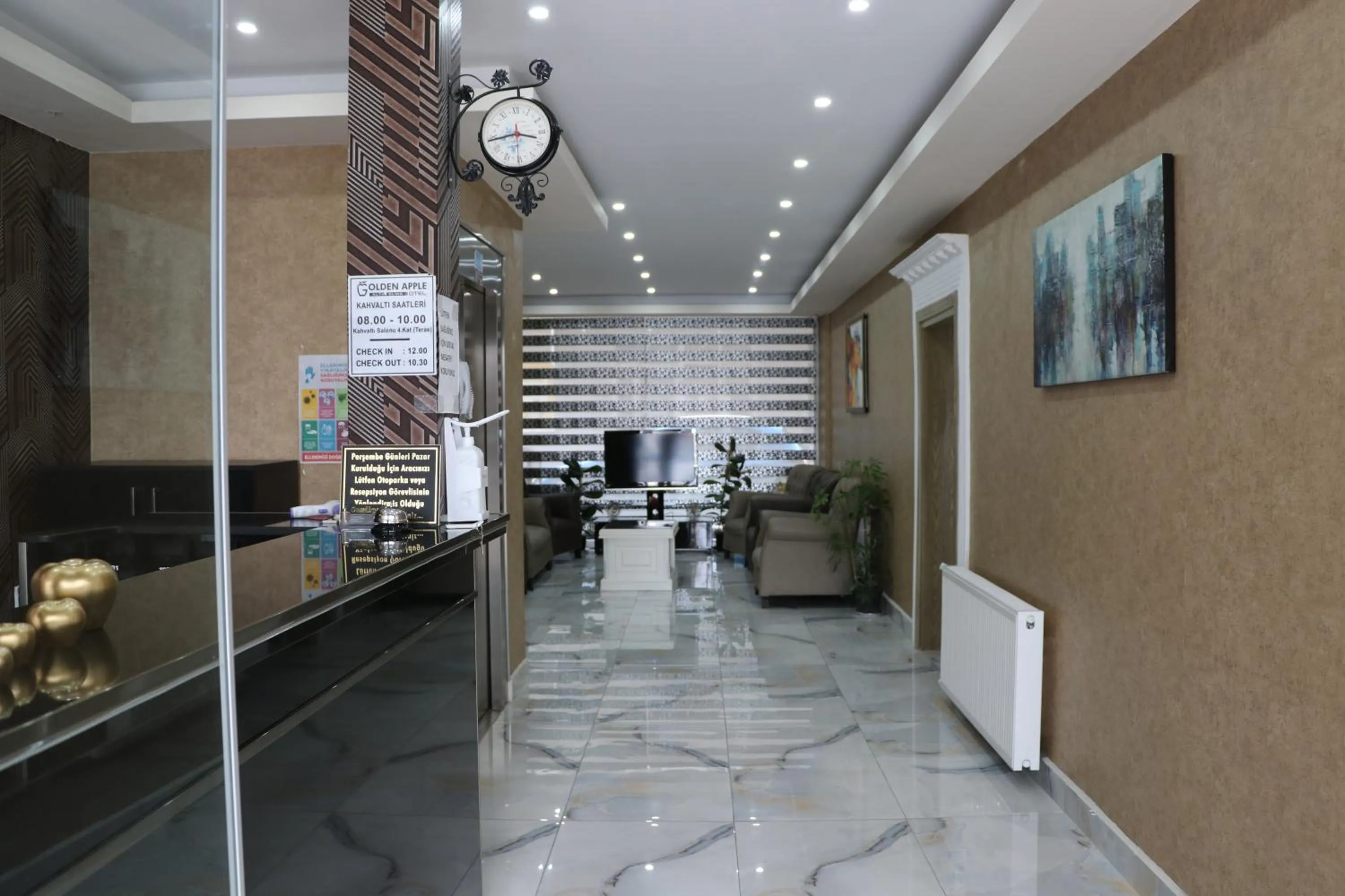 Lobby or reception in Golden Apple Hotel