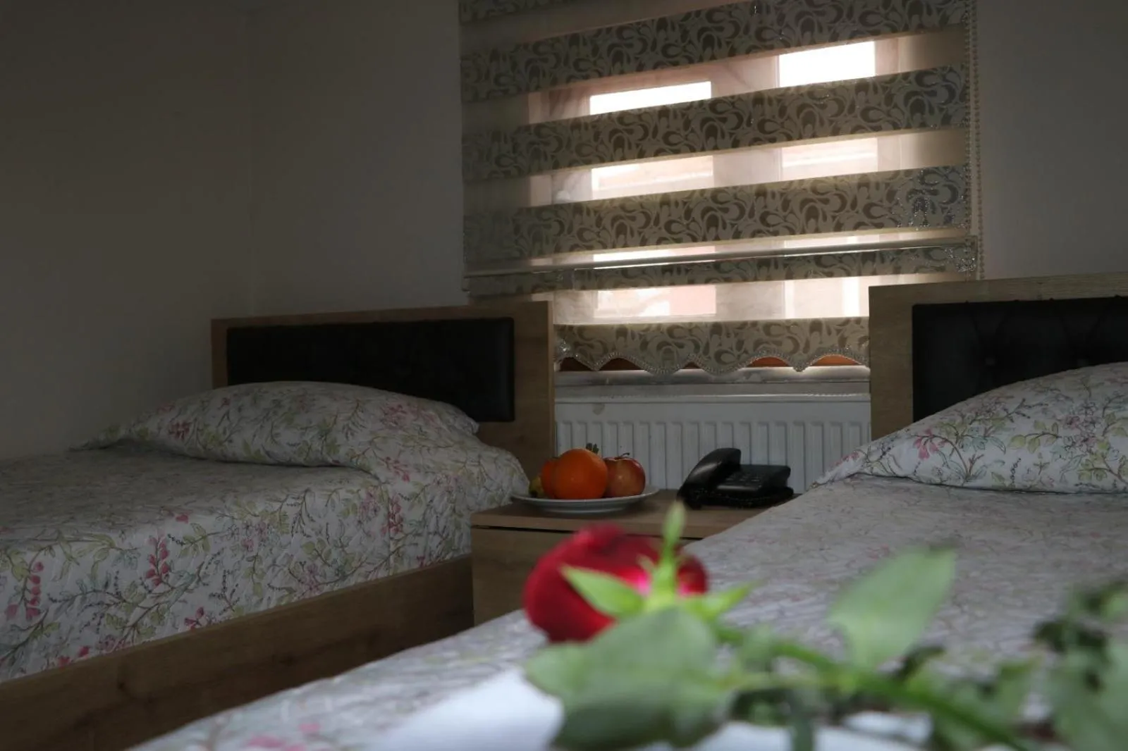 Bed in Golden Apple Hotel