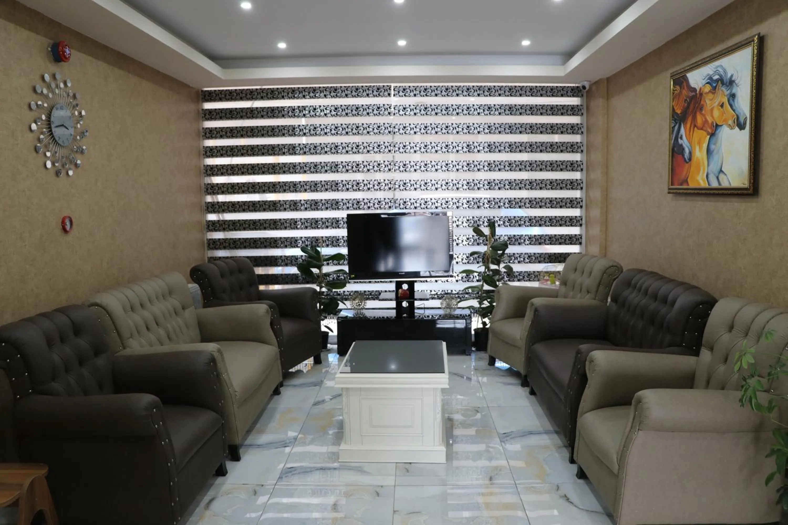 Seating area in Golden Apple Hotel