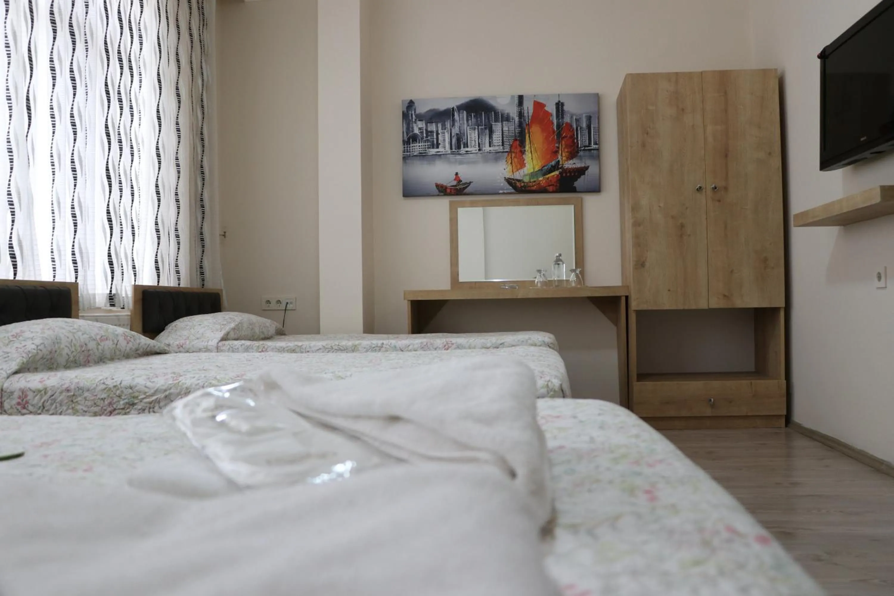 Photo of the whole room, Bed in Golden Apple Hotel