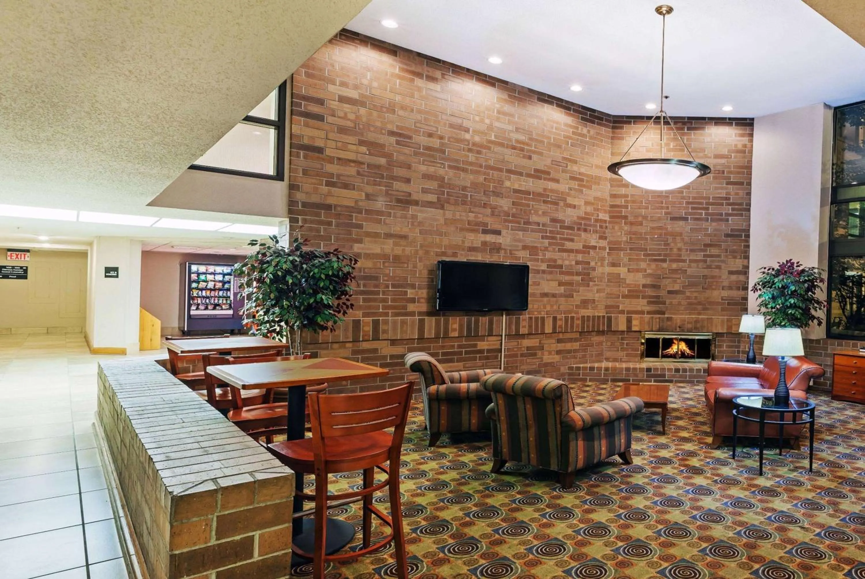 Lobby or reception in AmericInn by Wyndham Omaha