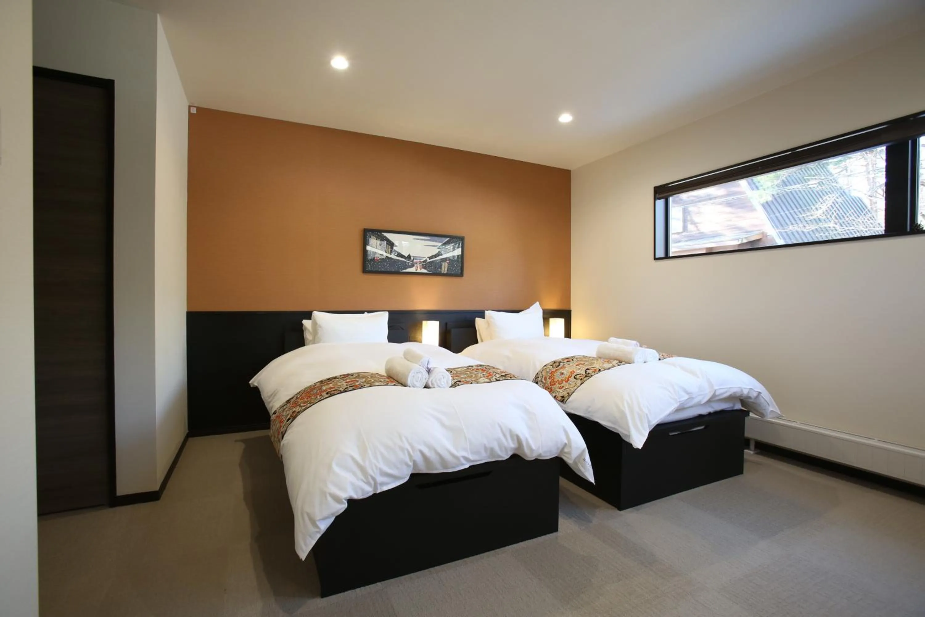 Bed in Snowlines Apartments Hakuba