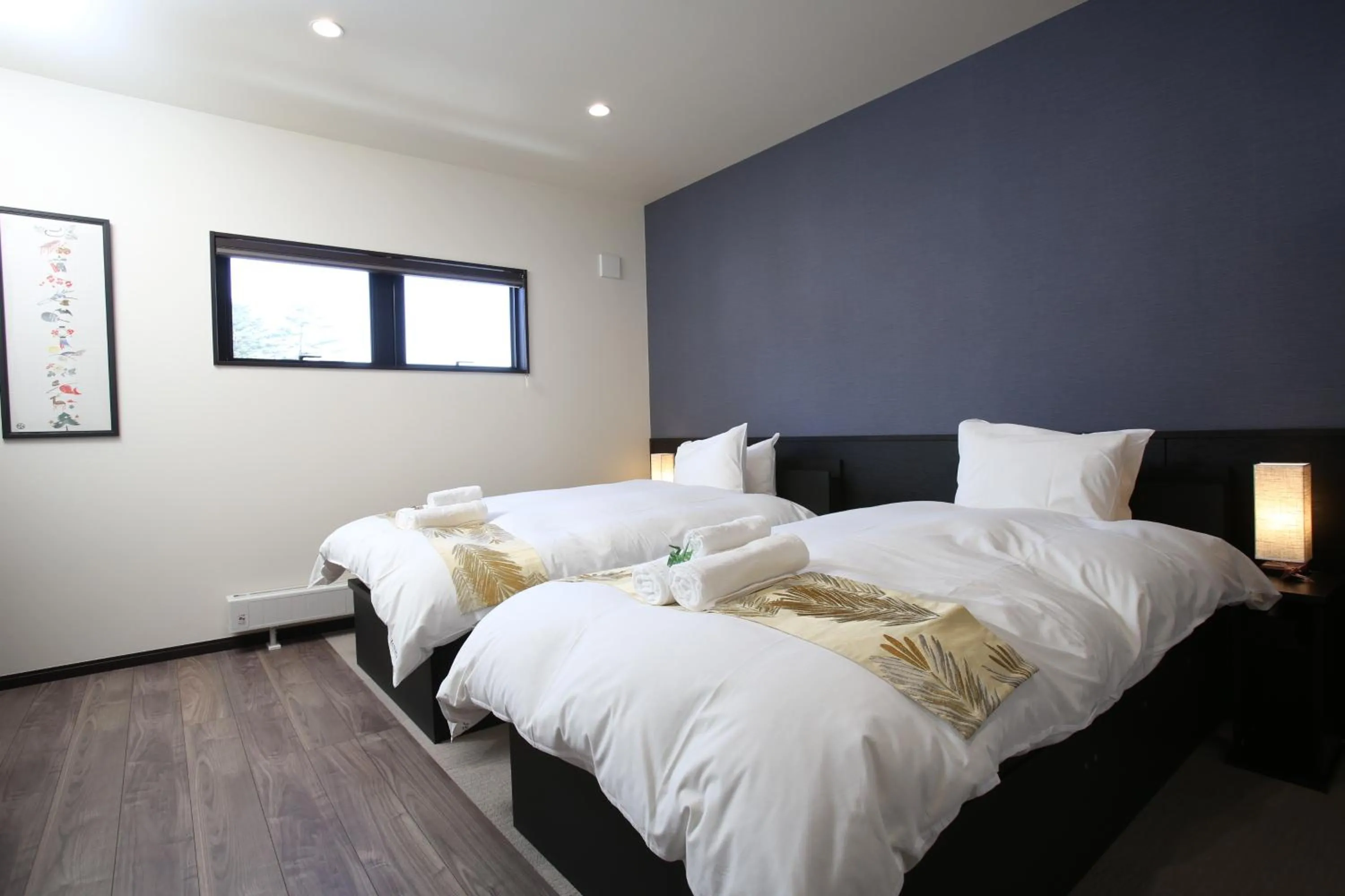 Bed in Snowlines Apartments Hakuba