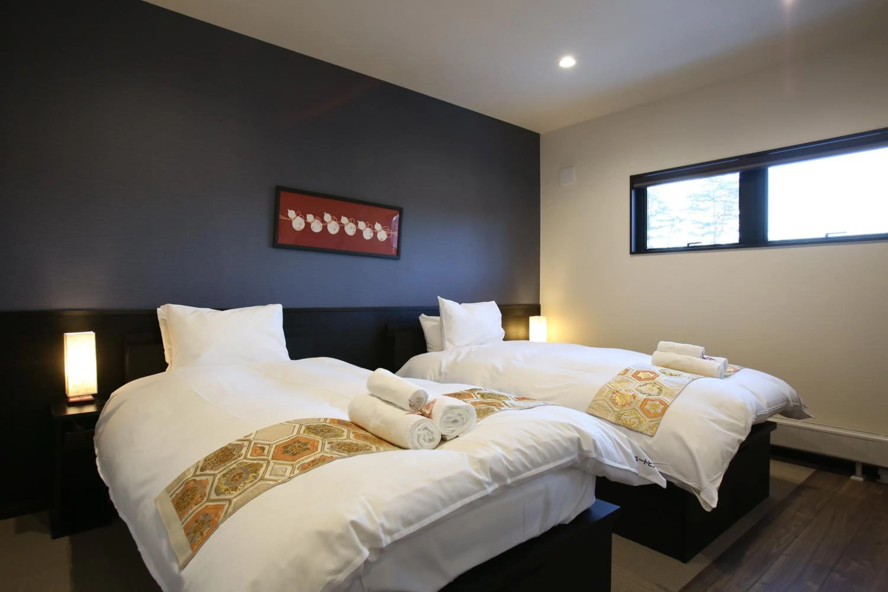 Bed in Snowlines Apartments Hakuba