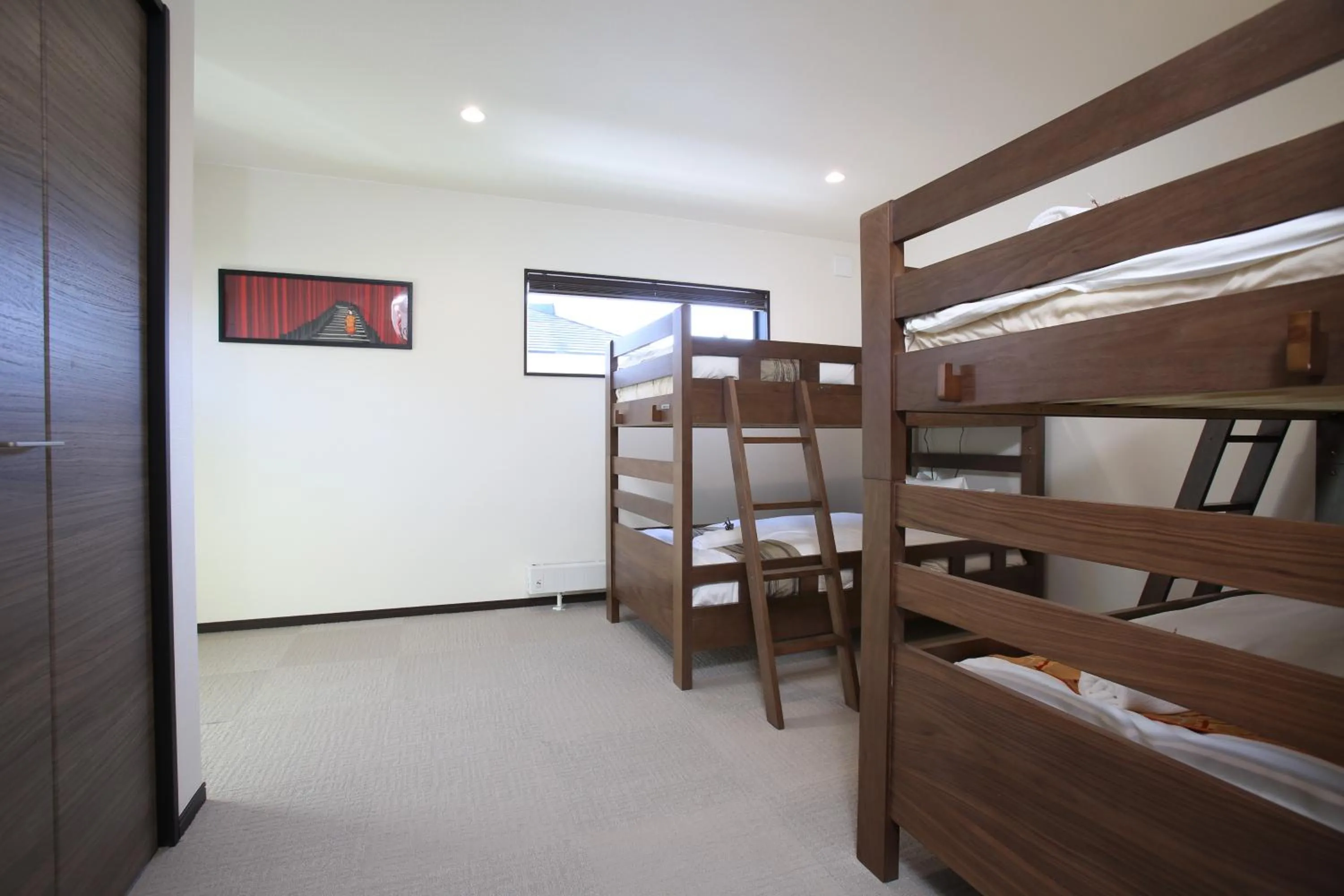Bed in Snowlines Apartments Hakuba