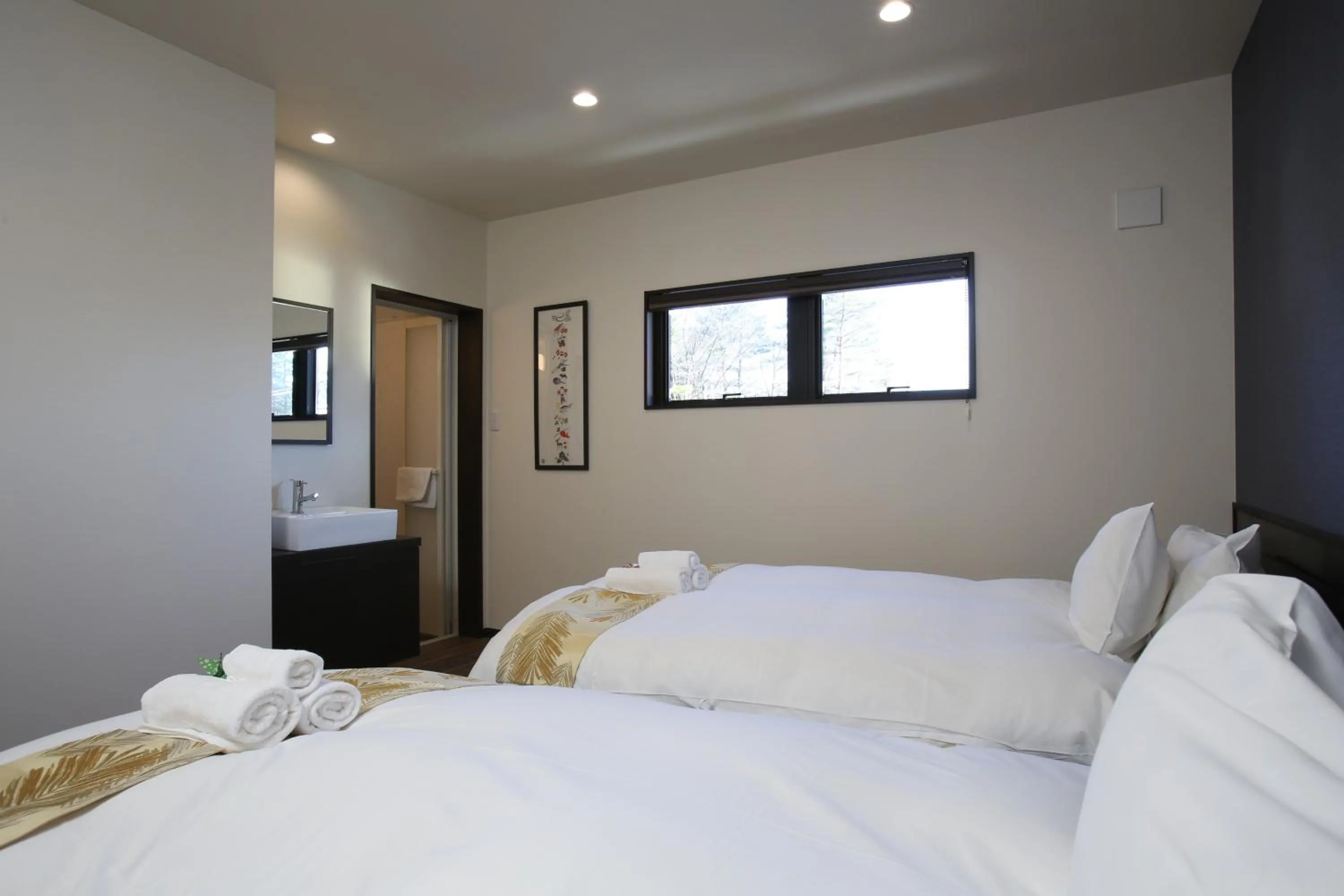 Bed in Snowlines Apartments Hakuba