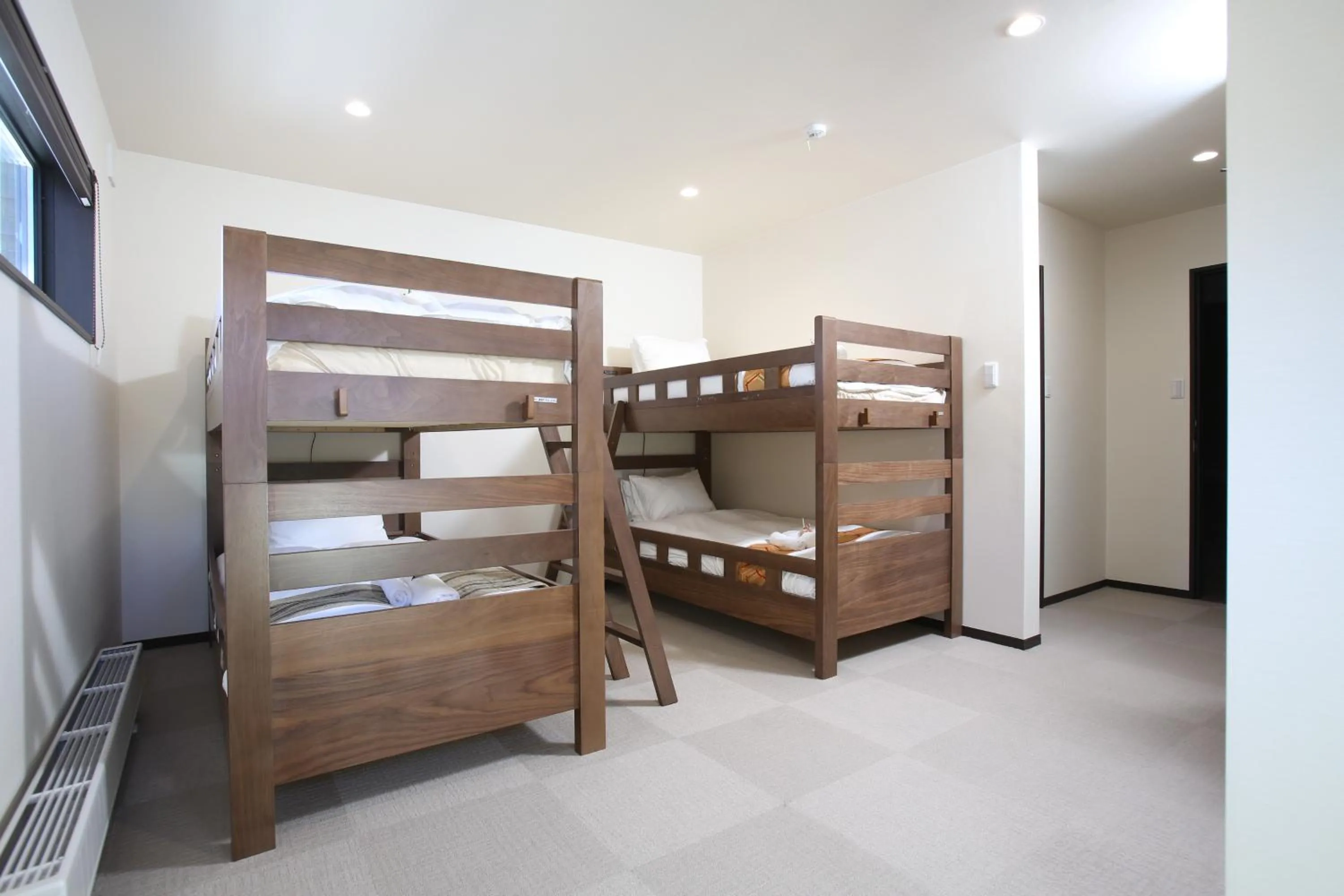 Bed in Snowlines Apartments Hakuba
