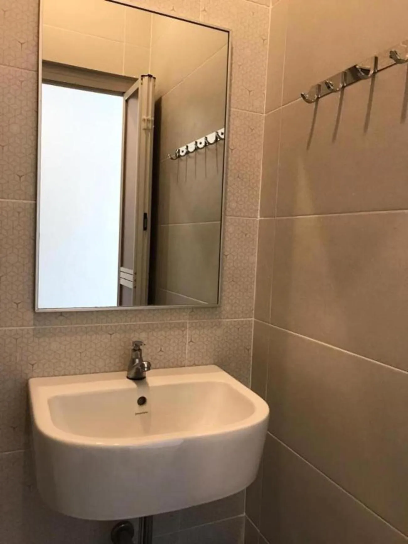 Toilet in TT Dorf Hotel Matang