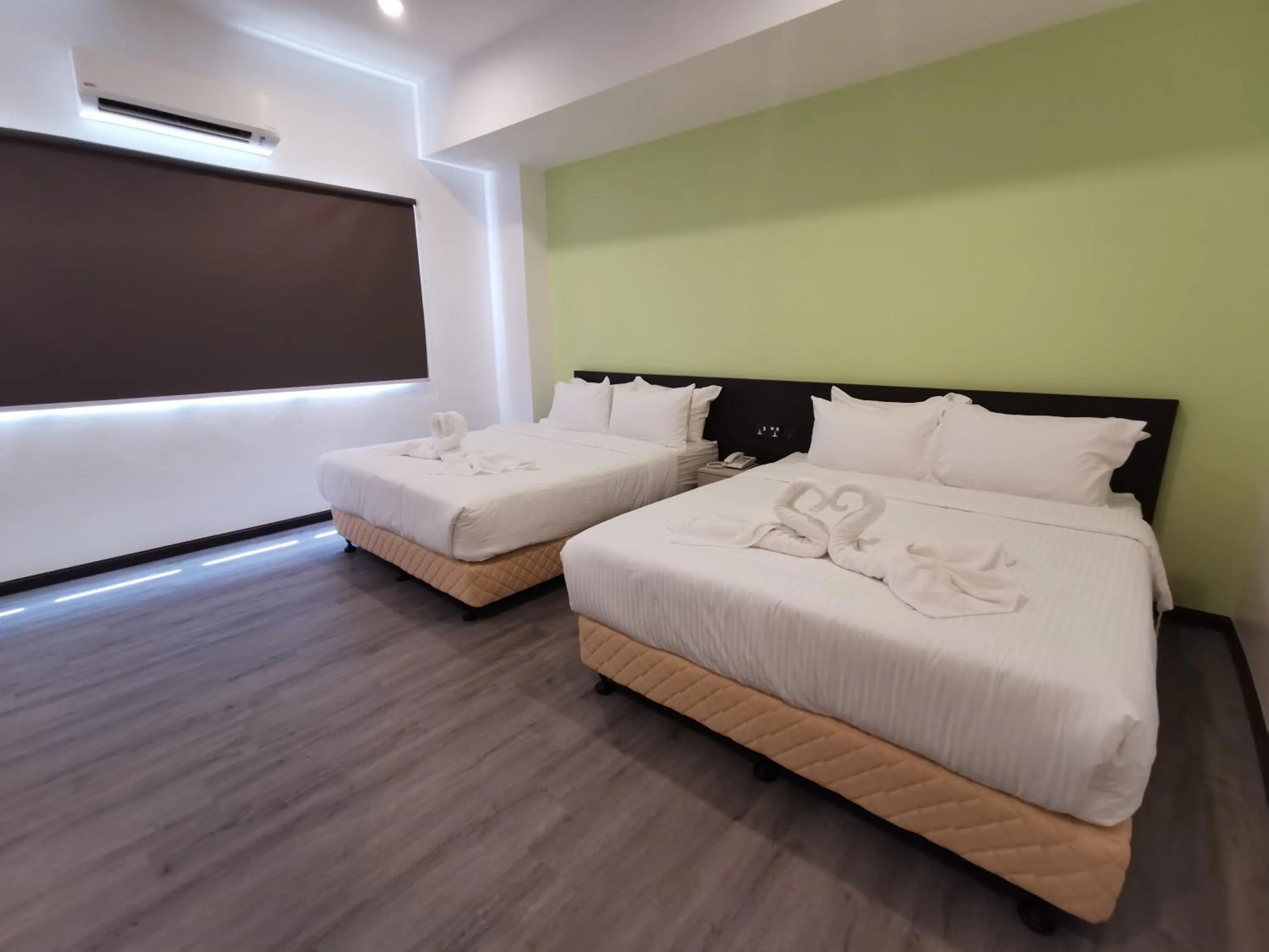 Photo of the whole room, Bed in TT Dorf Hotel Matang