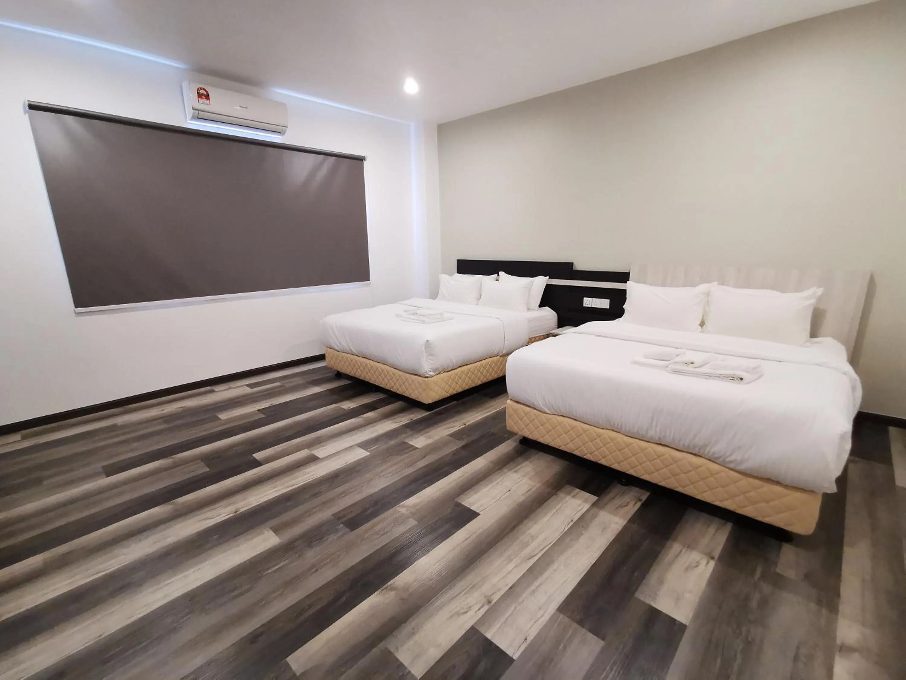 Photo of the whole room, Bed in TT Dorf Hotel Matang