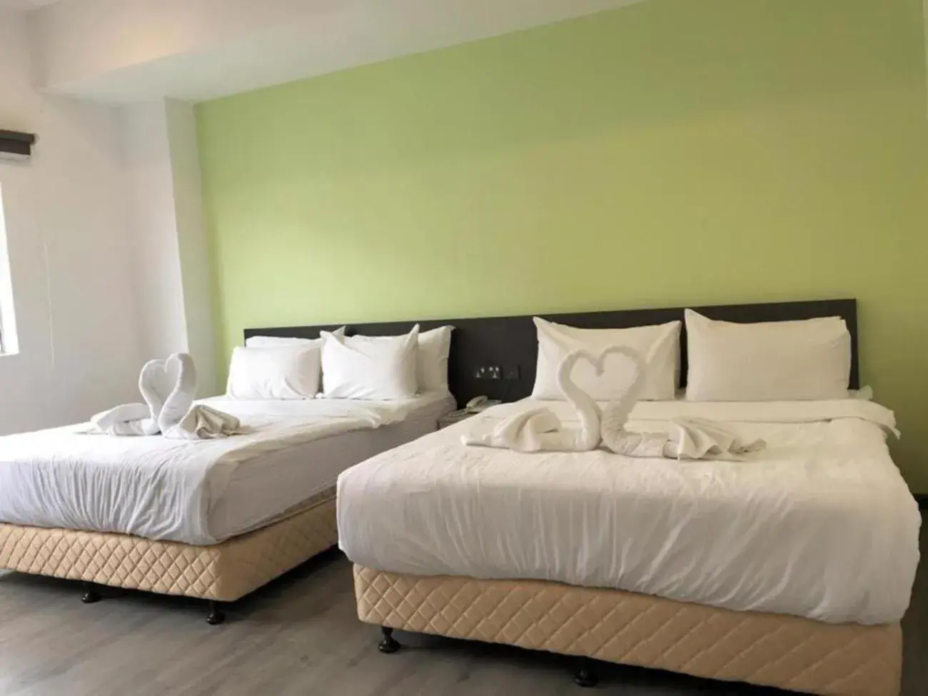 Photo of the whole room, Bed in TT Dorf Hotel Matang Photo of the whole room, Bed in TT Dorf Hotel Matang