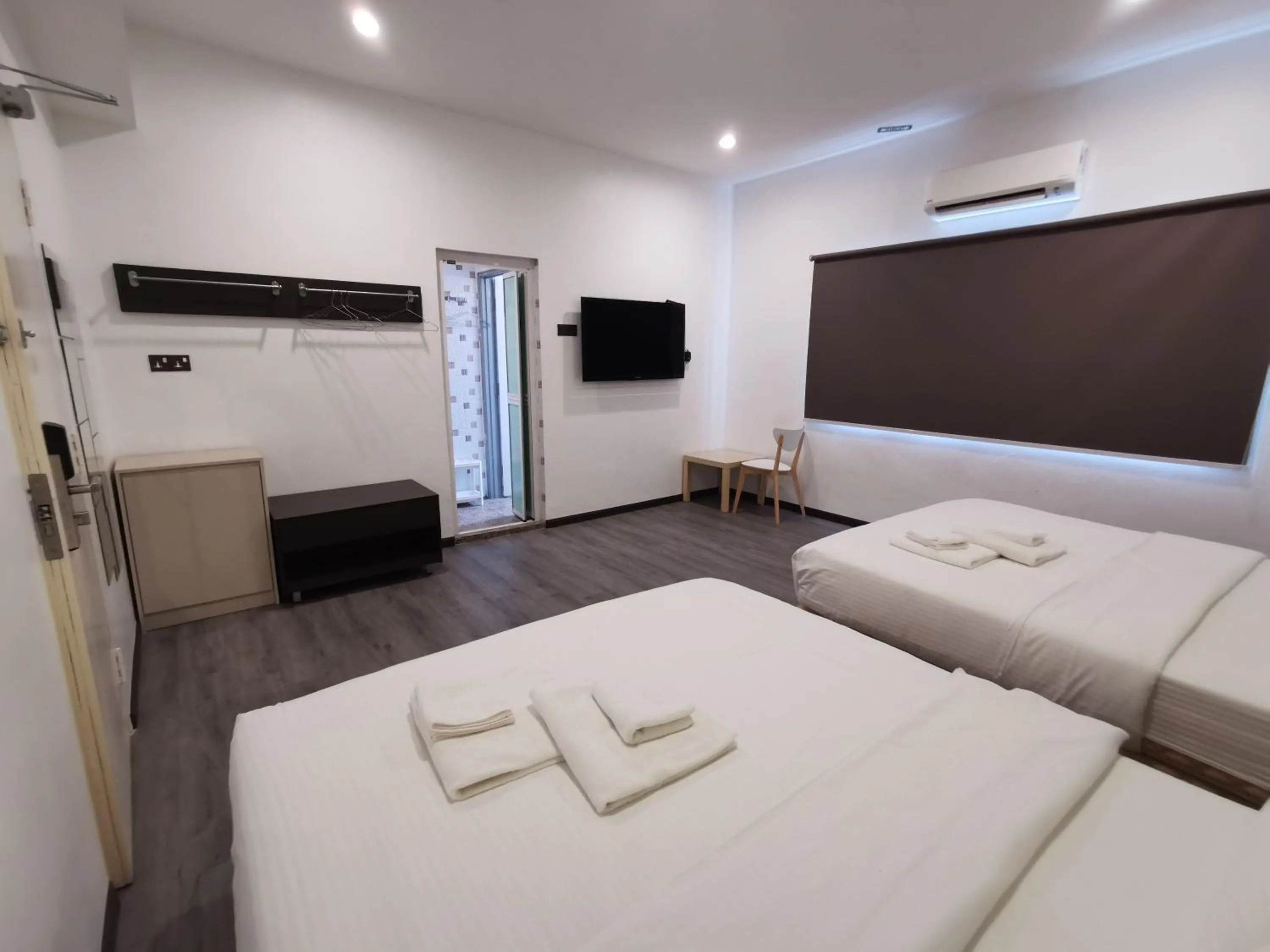 Photo of the whole room, Bed in TT Dorf Hotel Matang