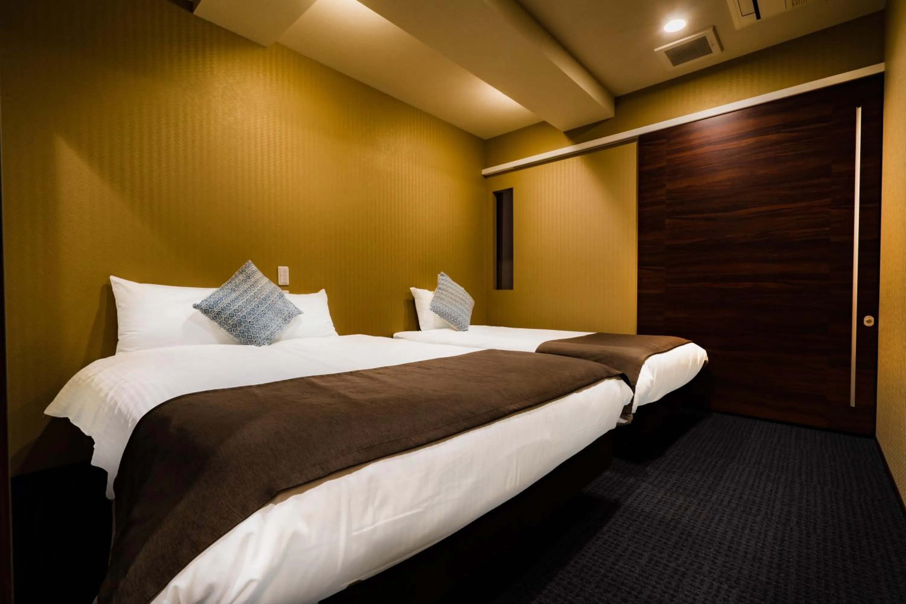 Bedroom, Bed in Randor Residence Susukino Suites