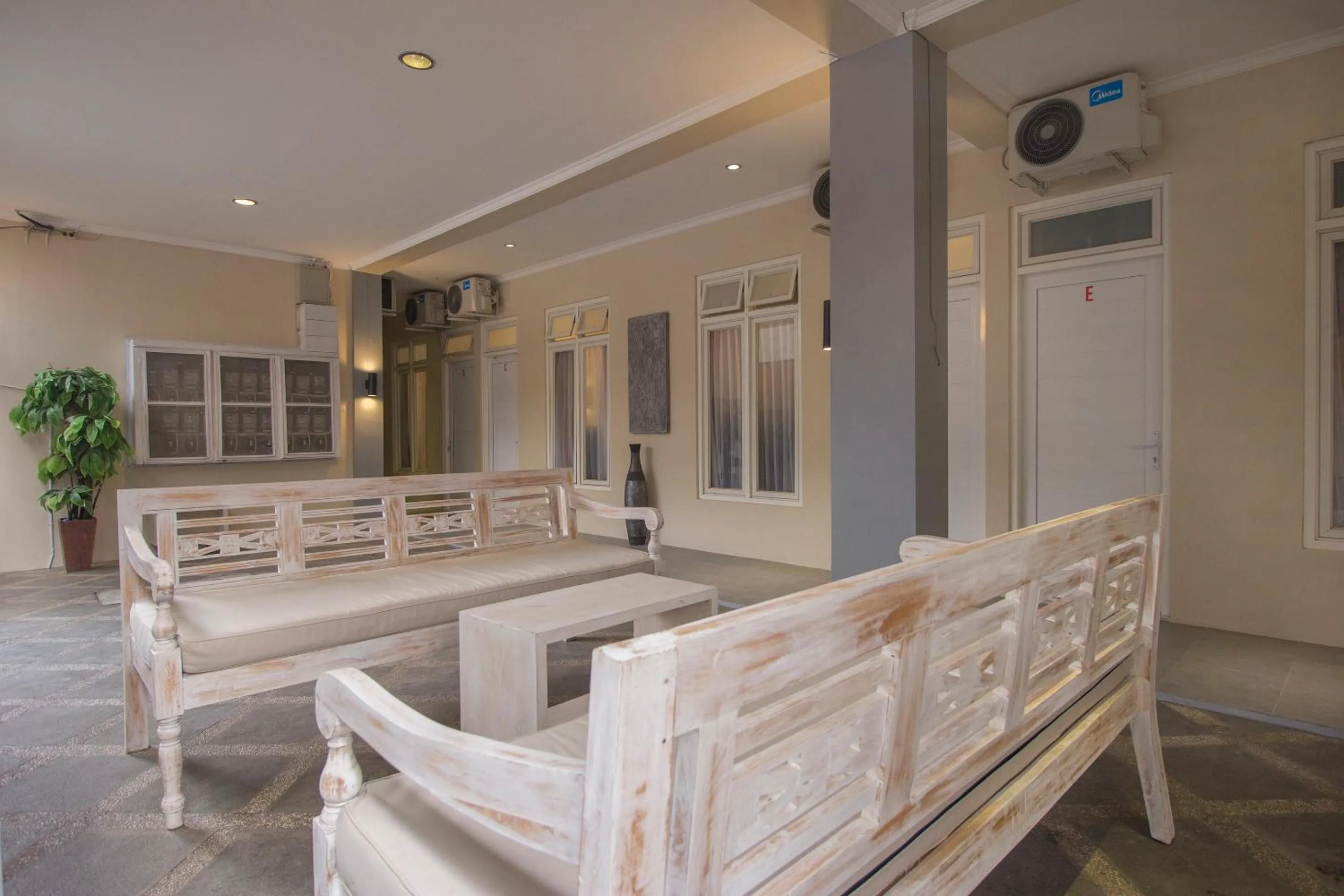 Communal lounge/ TV room in OYO 647 Irooms Homestay