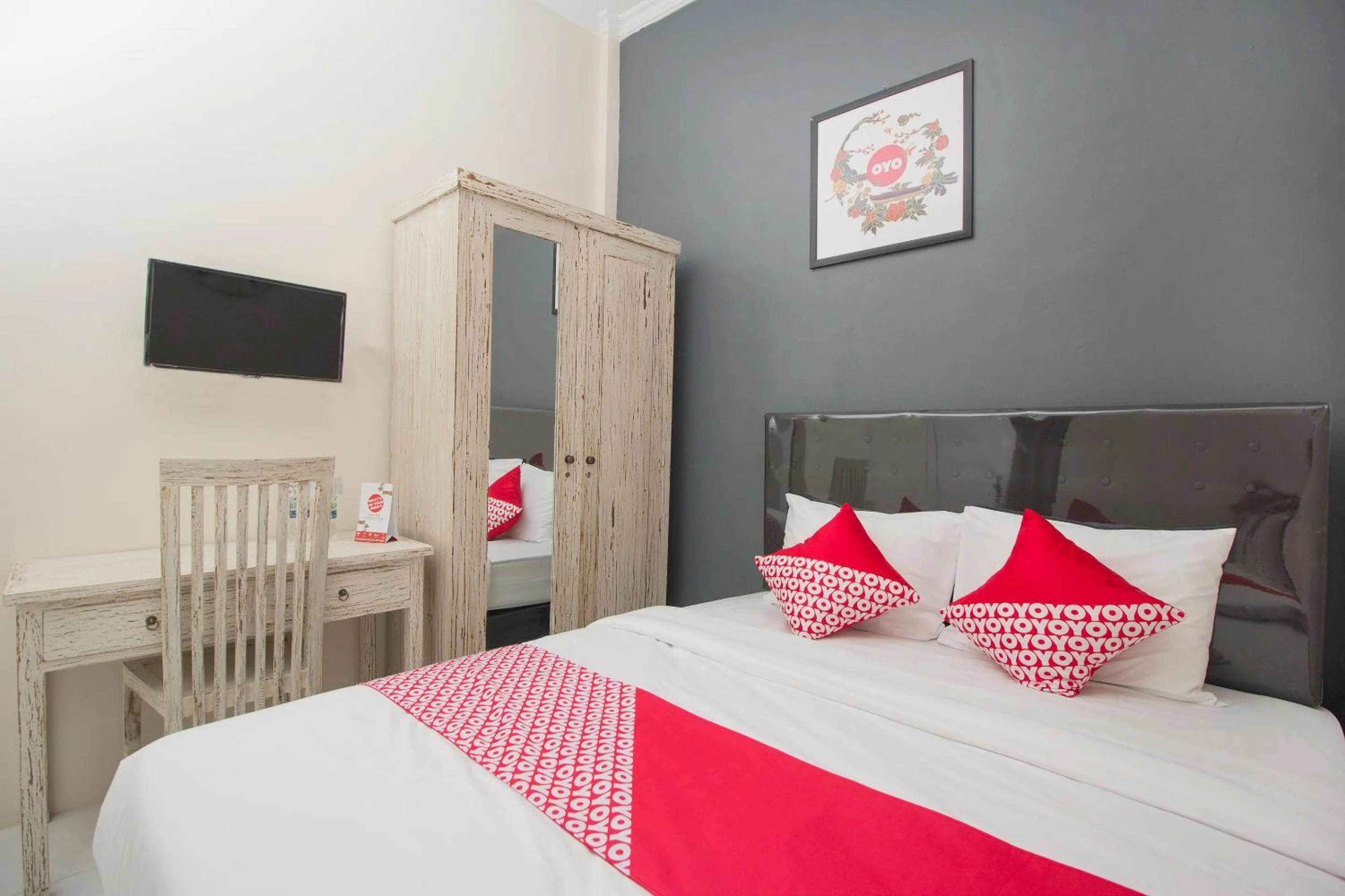 Bedroom in OYO 647 Irooms Homestay